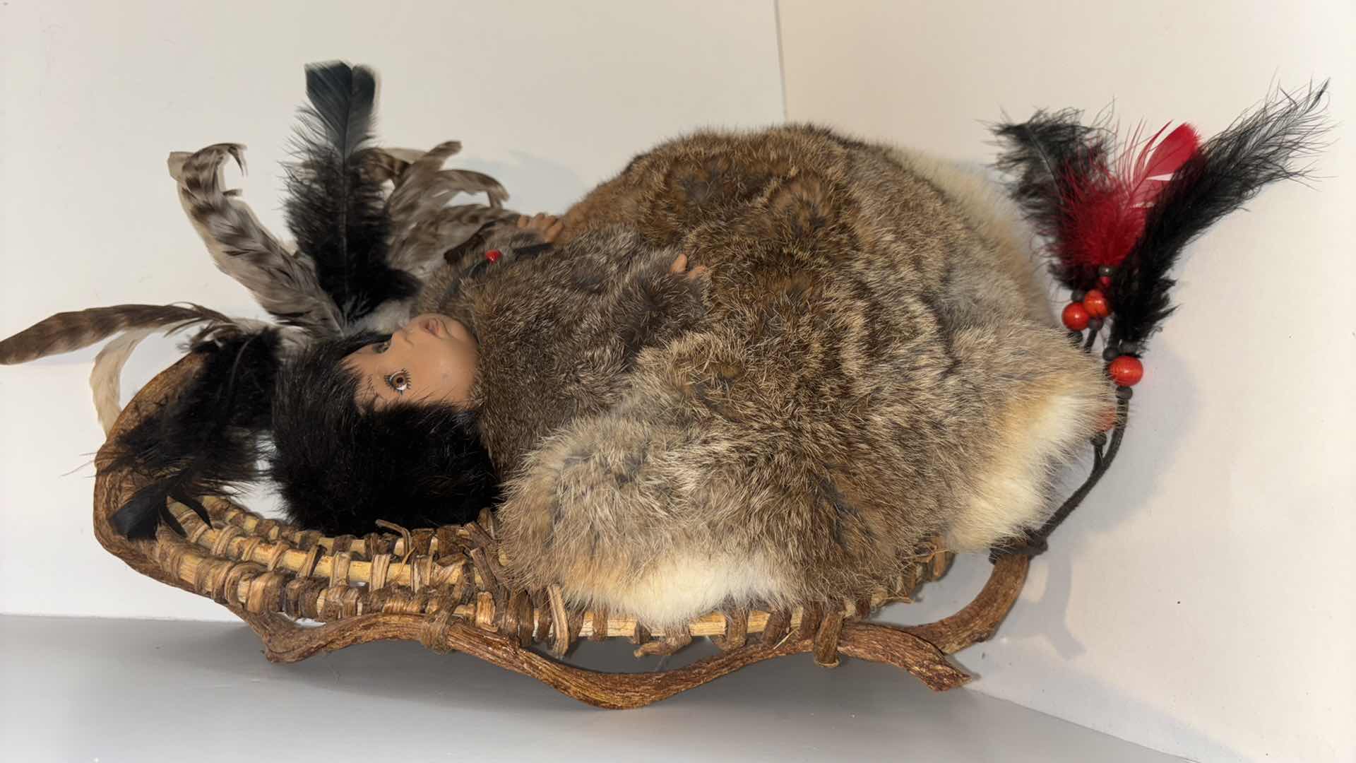 Photo 2 of NATIVE AMERICAN INDIAN DOLL IN WICKER PAPOOSE GENUINE FUR FEATHER WALL HANGING 14” x 17”