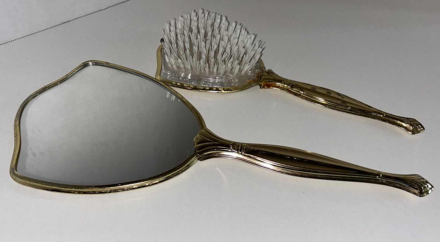 Photo 2 of VINTAGE HANDHELD MIRROR & BRUSH VANITY SET, GOLD TONE METAL FLORAL DESIGN (MIRROR 13.5”L)