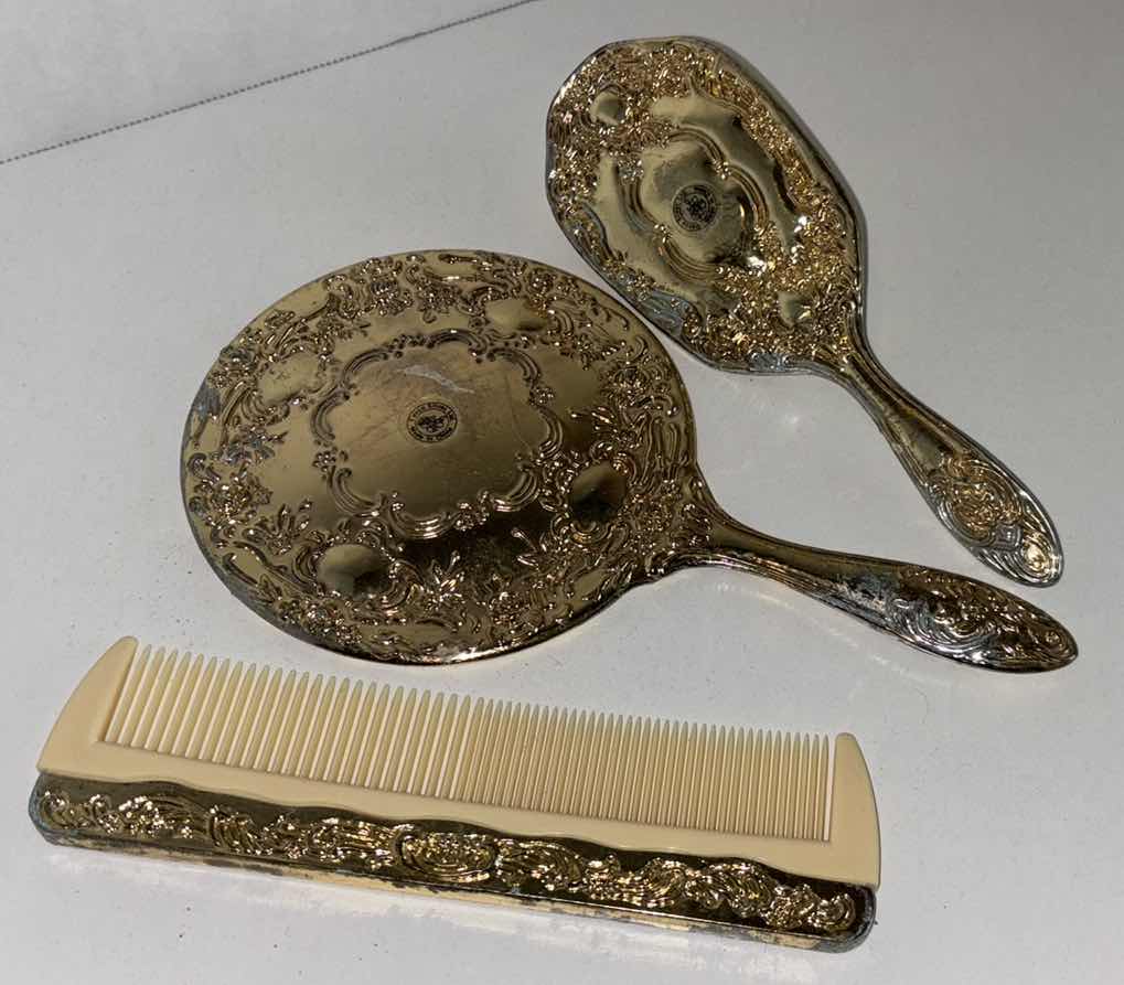 Photo 1 of DAVCO SILVER LTD GOLD TONED MIRROR, BRUSH & COMB VANITY SET (COMB IS 7.25”)