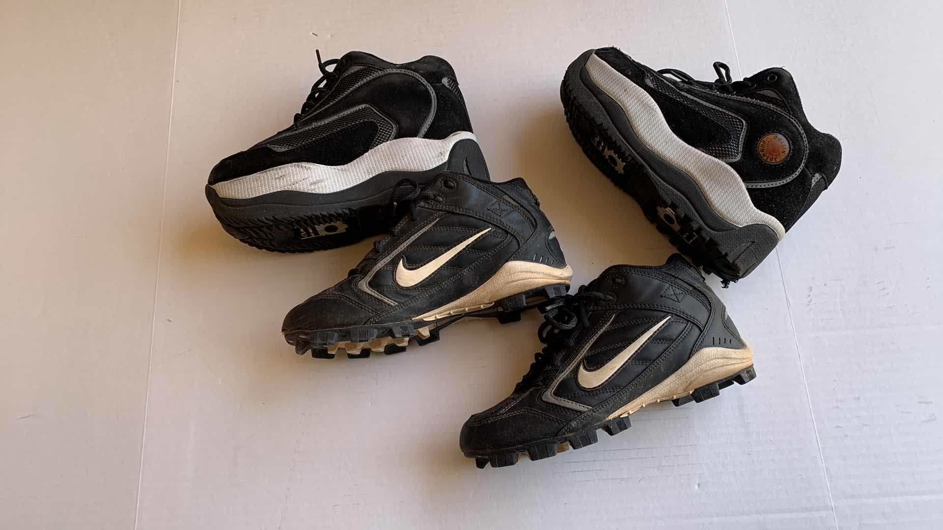 Photo 1 of BOYS NIKE FOOTBALL CLEATS SIZE 6.5 AND ROLLIN RUNNERS SIZE 6