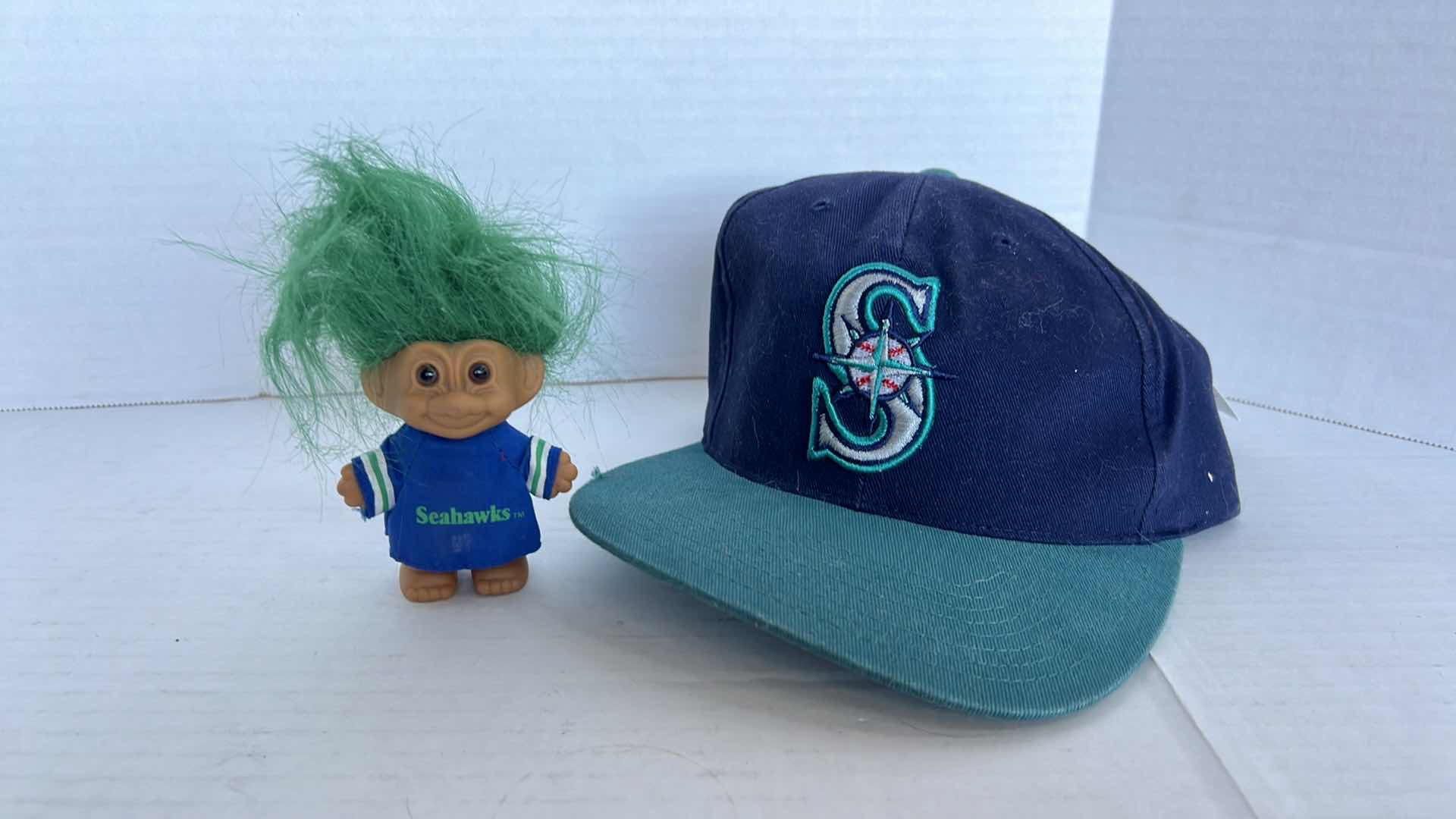 Photo 1 of SEATTLE BASEBALL MLB CAP AND NFL SEAHAWKS TROLL