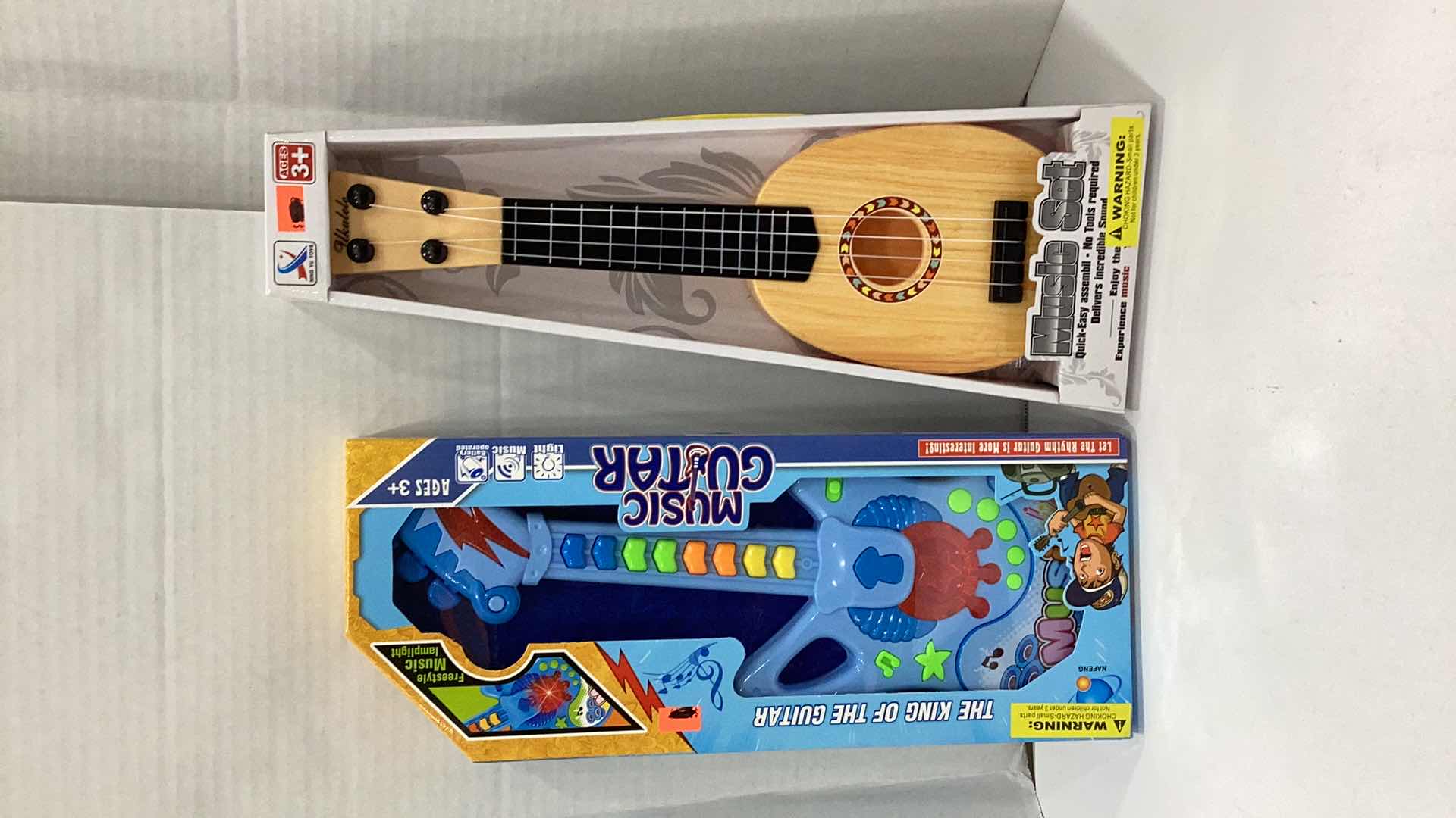 Photo 1 of 2 PCS KID GUITAR TOYS