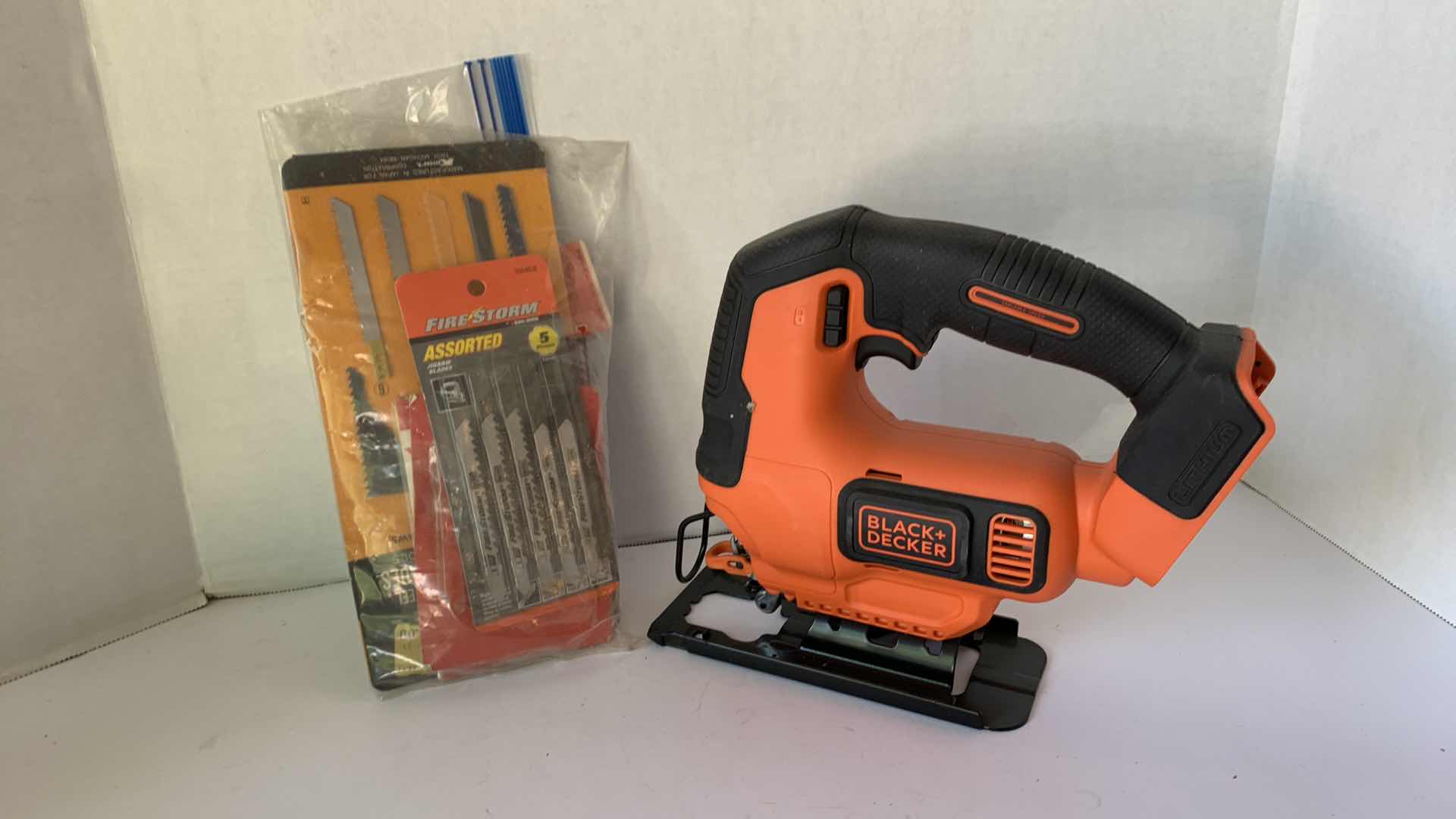 Photo 1 of BLACK AND DECKER JIGSAW WITH BLADES NO BATTERY