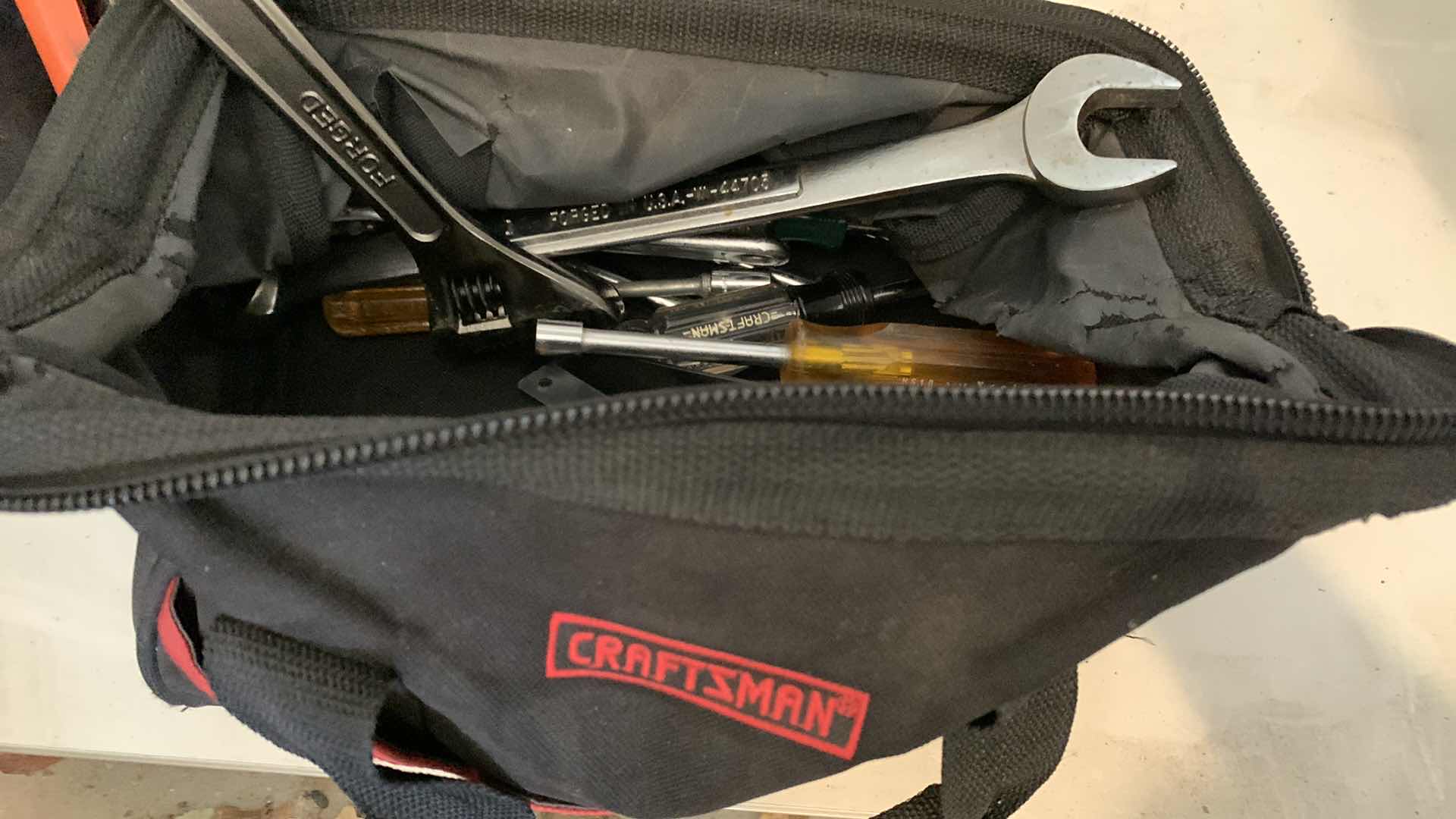 Photo 1 of CRAFTSMAN BAG WITH NUT RUNNERS,  CHISELS AND WRENCHES