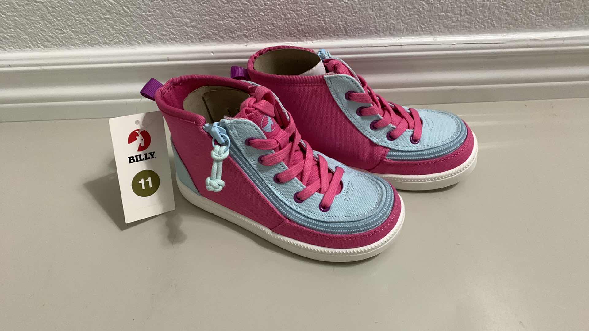 Photo 1 of GIRLS ZIPPERED HI TOPS SIZE 11