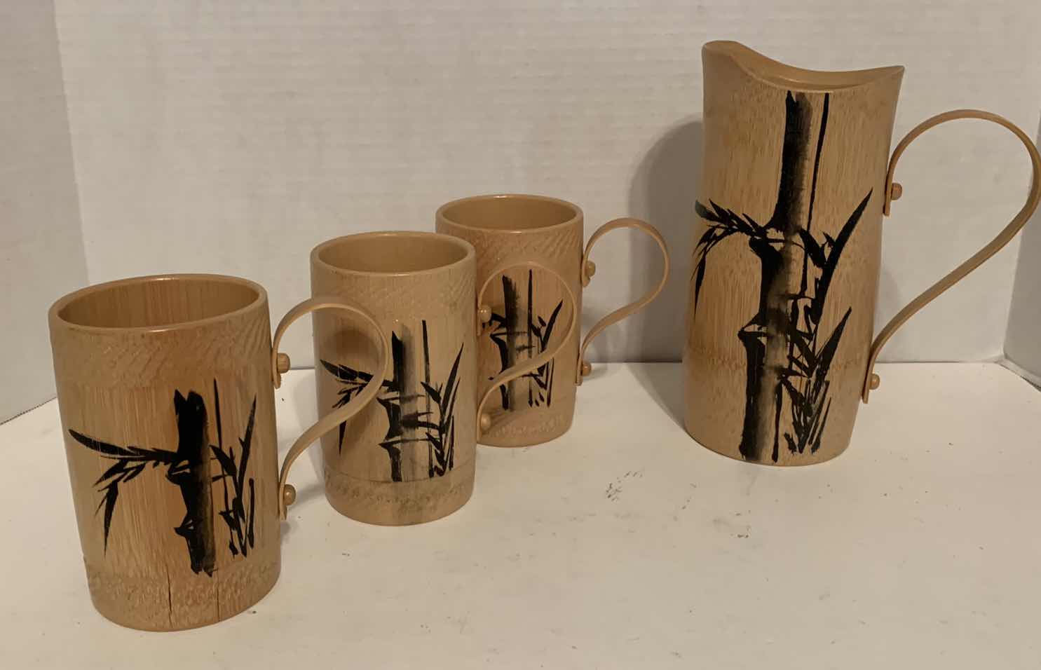 Photo 1 of BAMBOO PITCHER WITH MUSIC BOX AND MUGS