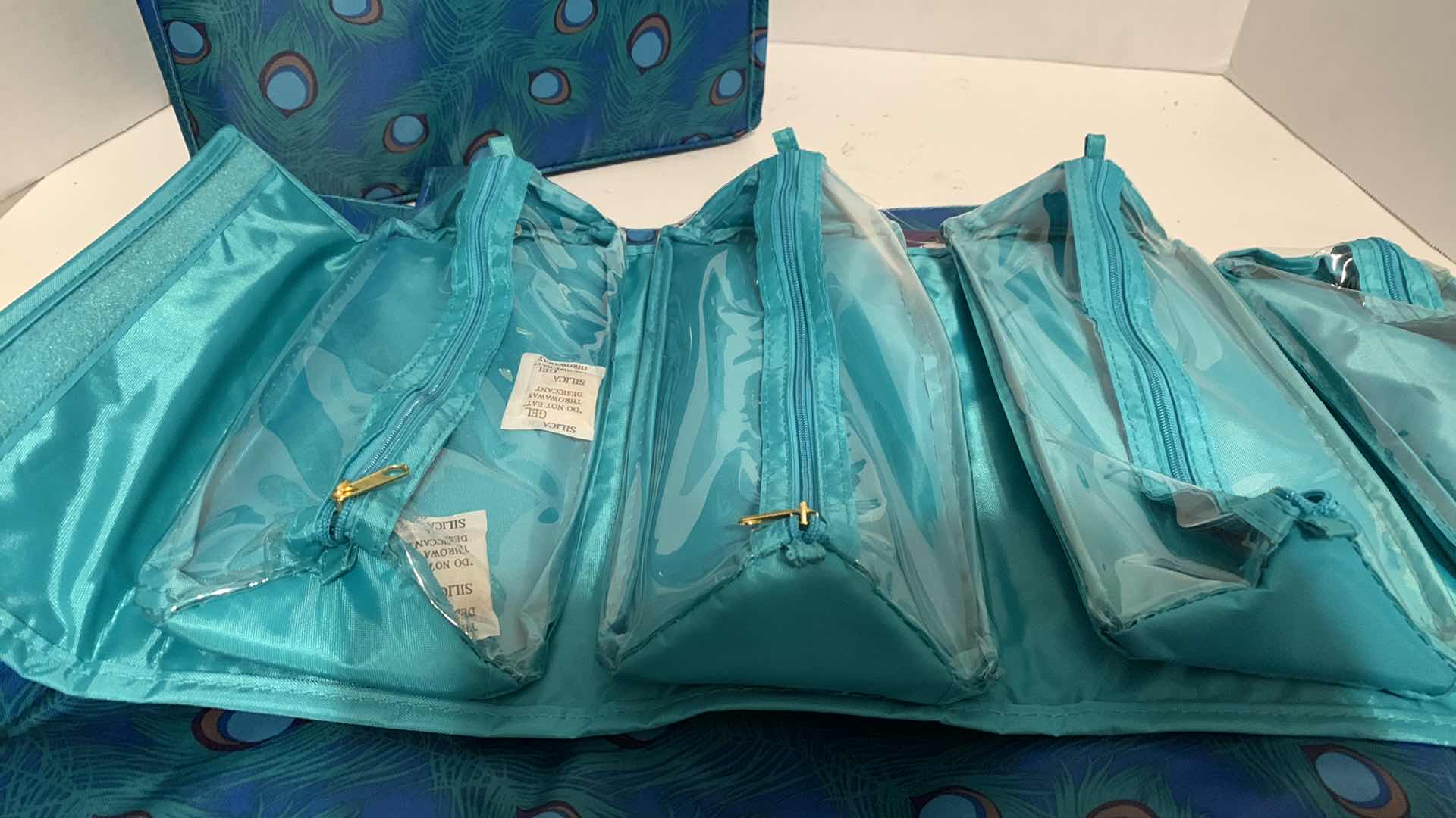 Photo 1 of JOY MANGANO PEACOCK INSPIRED TRAVEL SETS