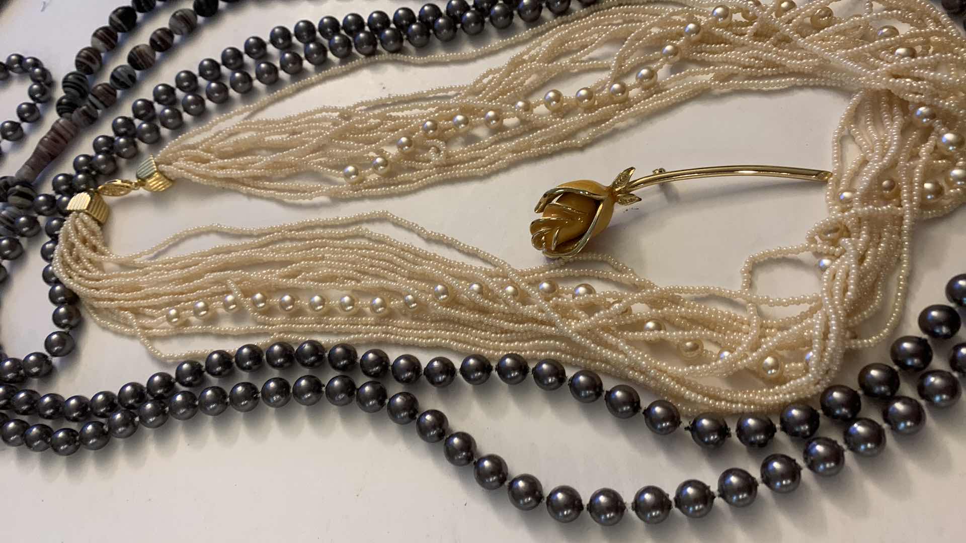 Photo 1 of NECKLACES AND A ROSE PIN