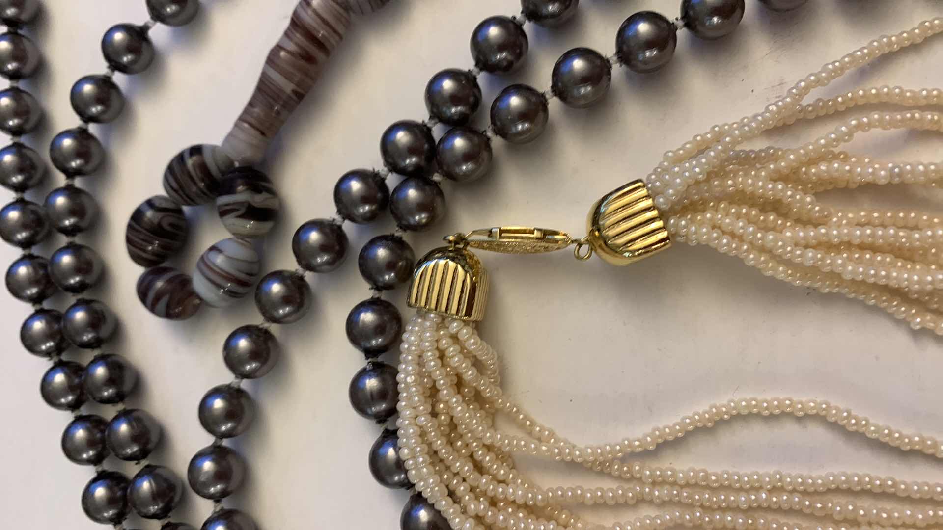 Photo 1 of NECKLACES AND A ROSE PIN