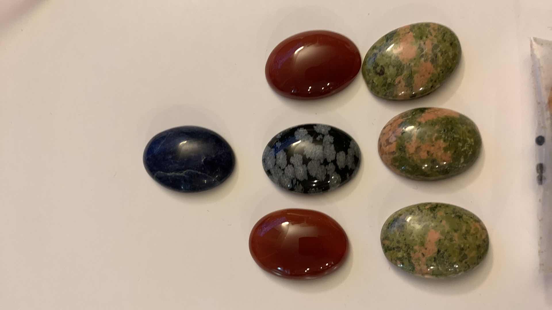 Photo 1 of CARNELIAN, UNAKITE, SNOW FLAKE OBSIDIAN, AND BLUE AVENTURINE STONES