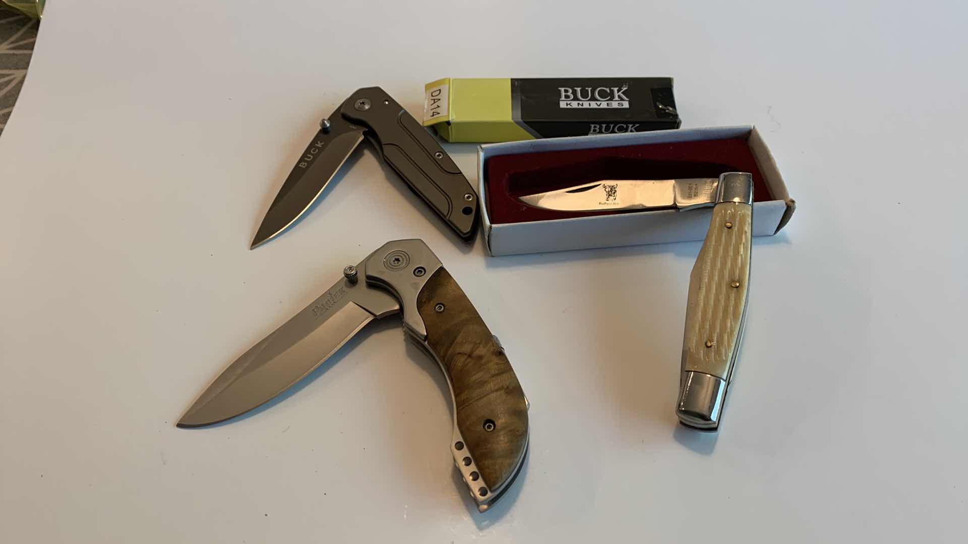 Photo 1 of THREE KNIVES INCLUDING A BUCK ONE