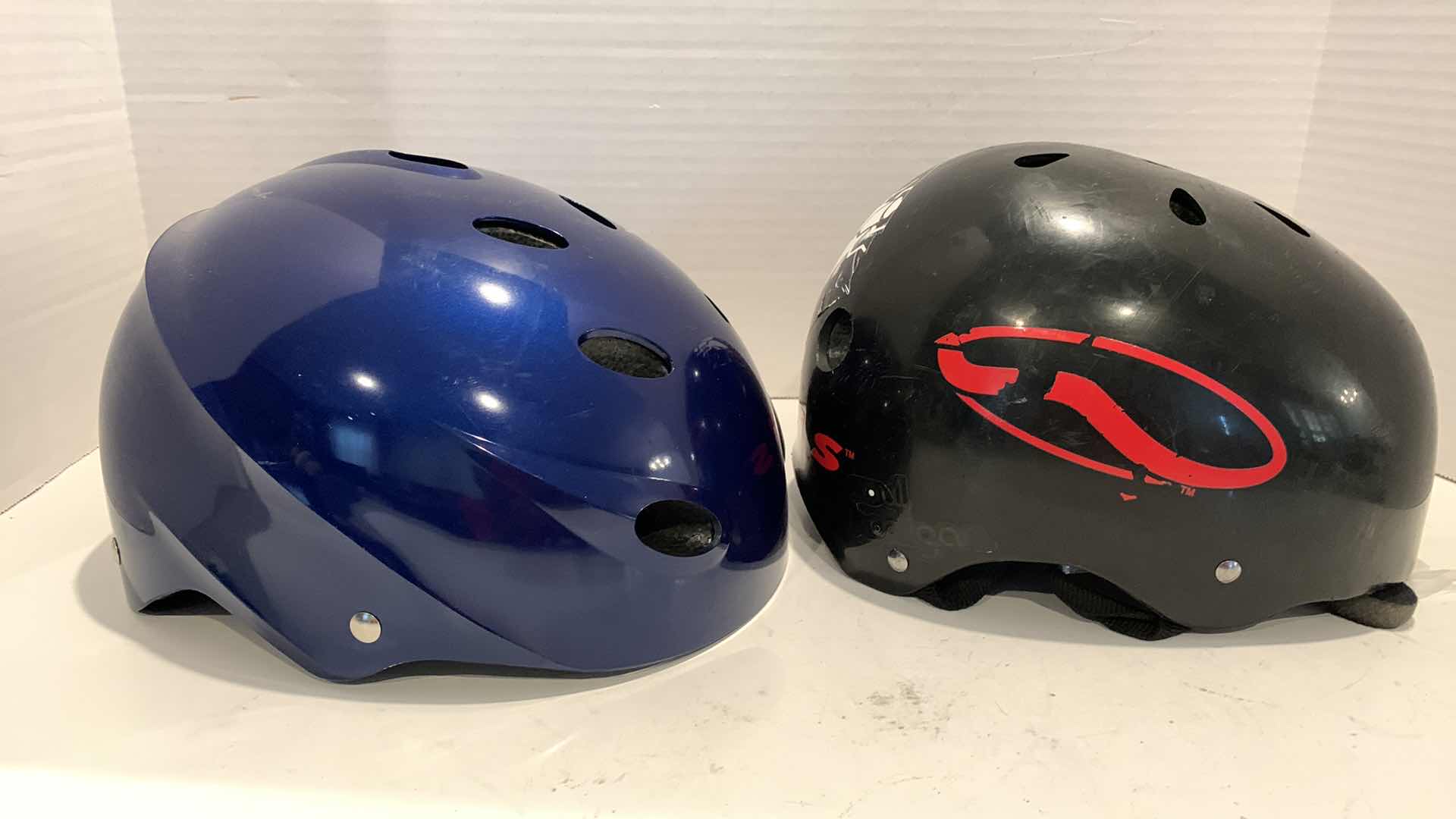 Photo 1 of PAIR OF SKATE OR BICYCLE HELMETS SIZE SMALL