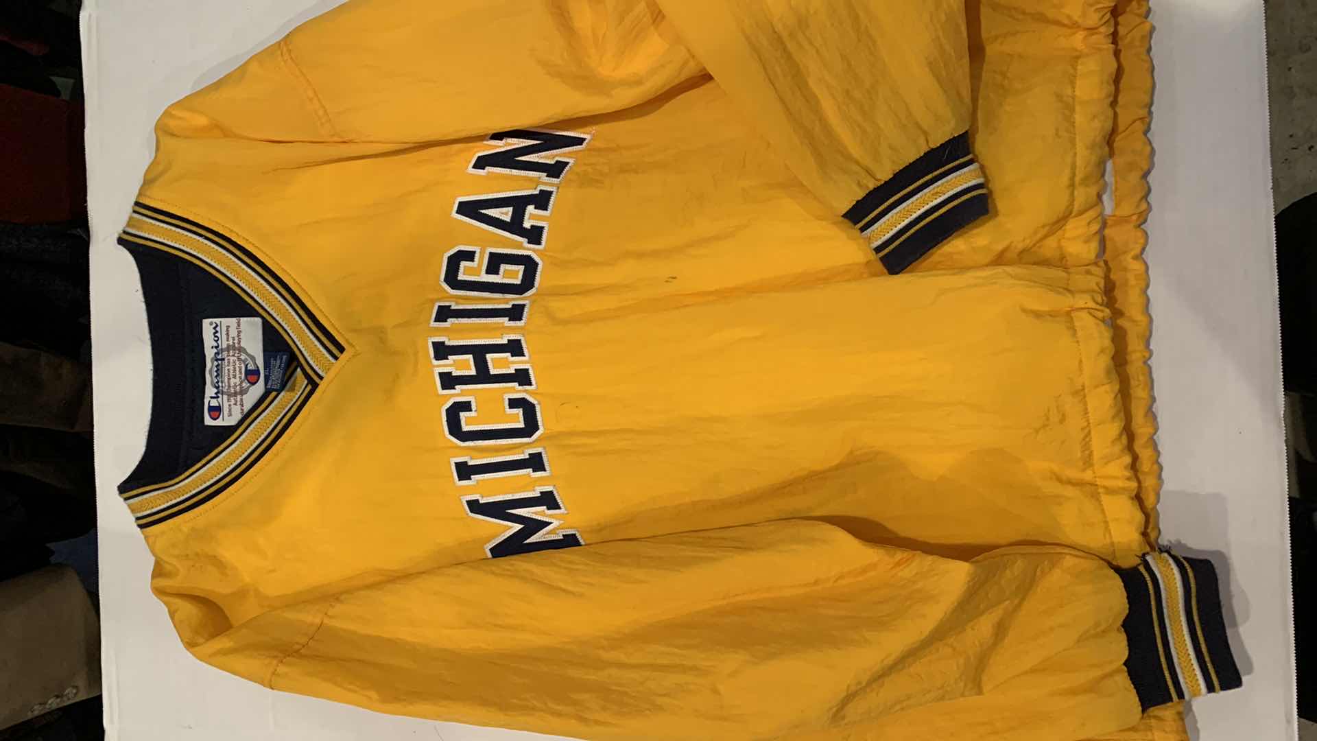 Photo 1 of MENS CHAMPION MICHIGAN RAIN PULL OVER SIZE XL