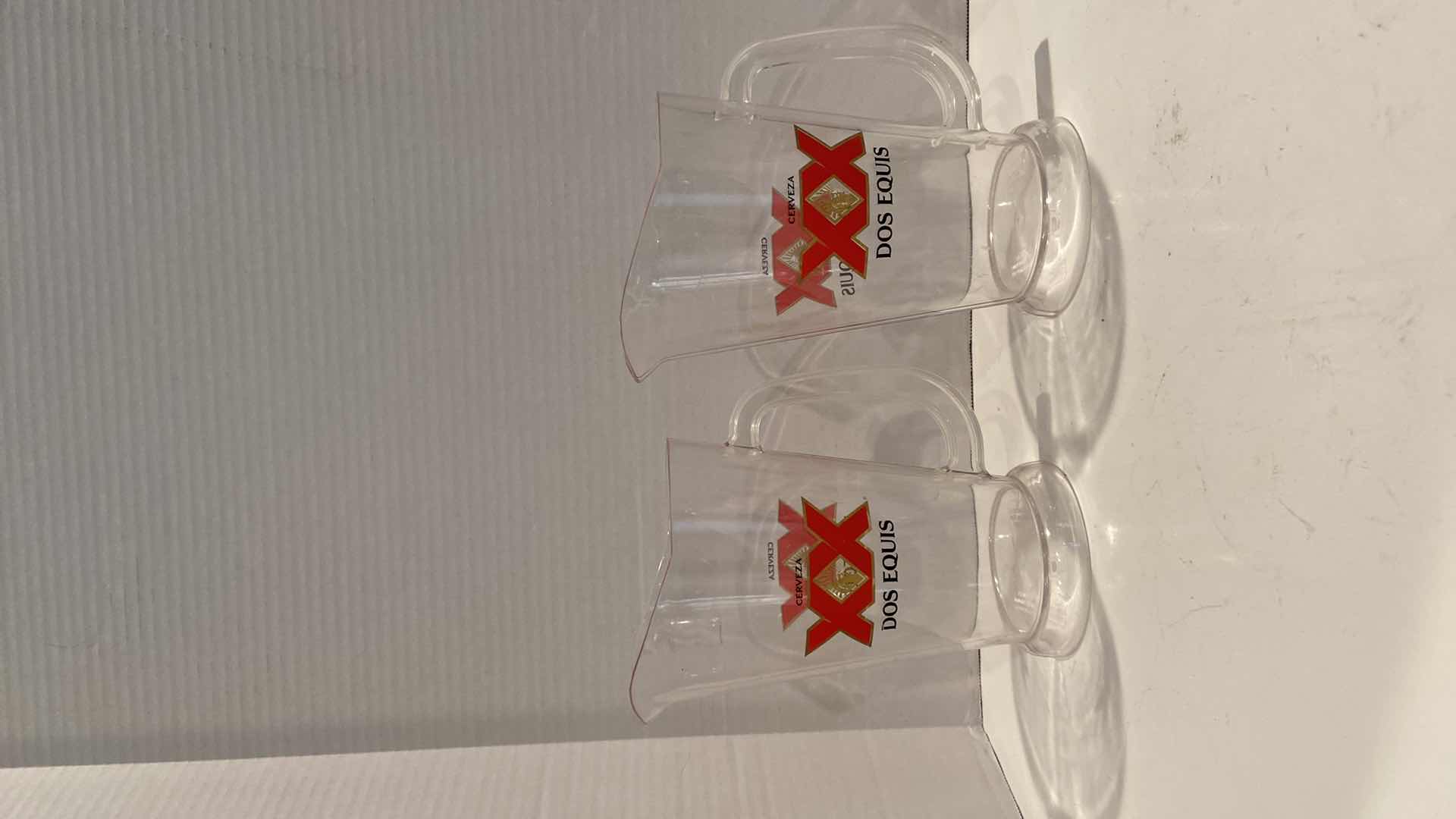 Photo 2 of SET OF DOS EQUIS  PITCHERS, AND 3 GLASSES