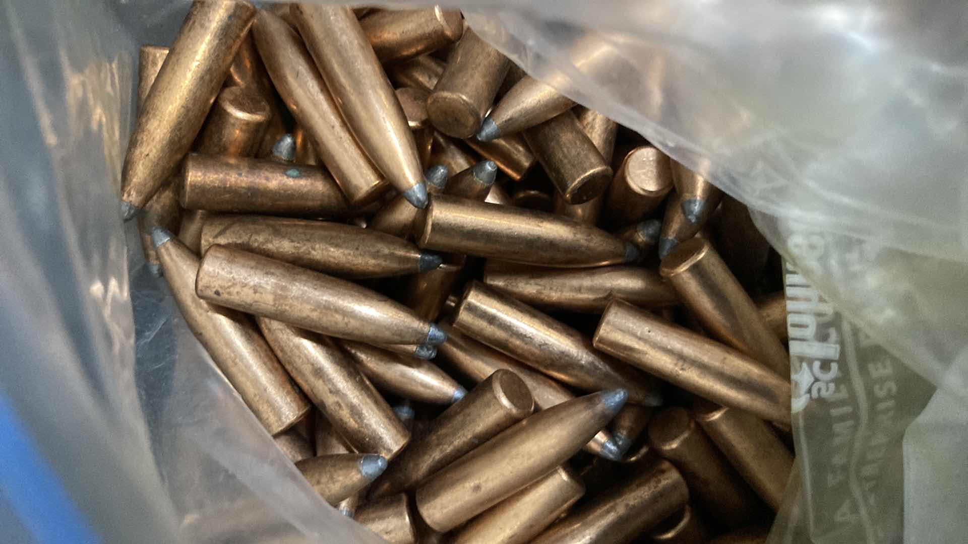 Photo 3 of .242 101GR BULLETS (APPROX 300)