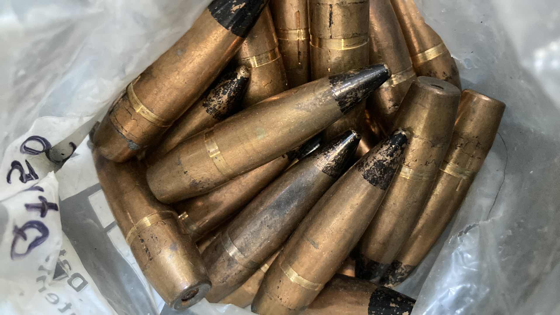 Photo 3 of 50 CAL AP BULLETS (APPROX 50)