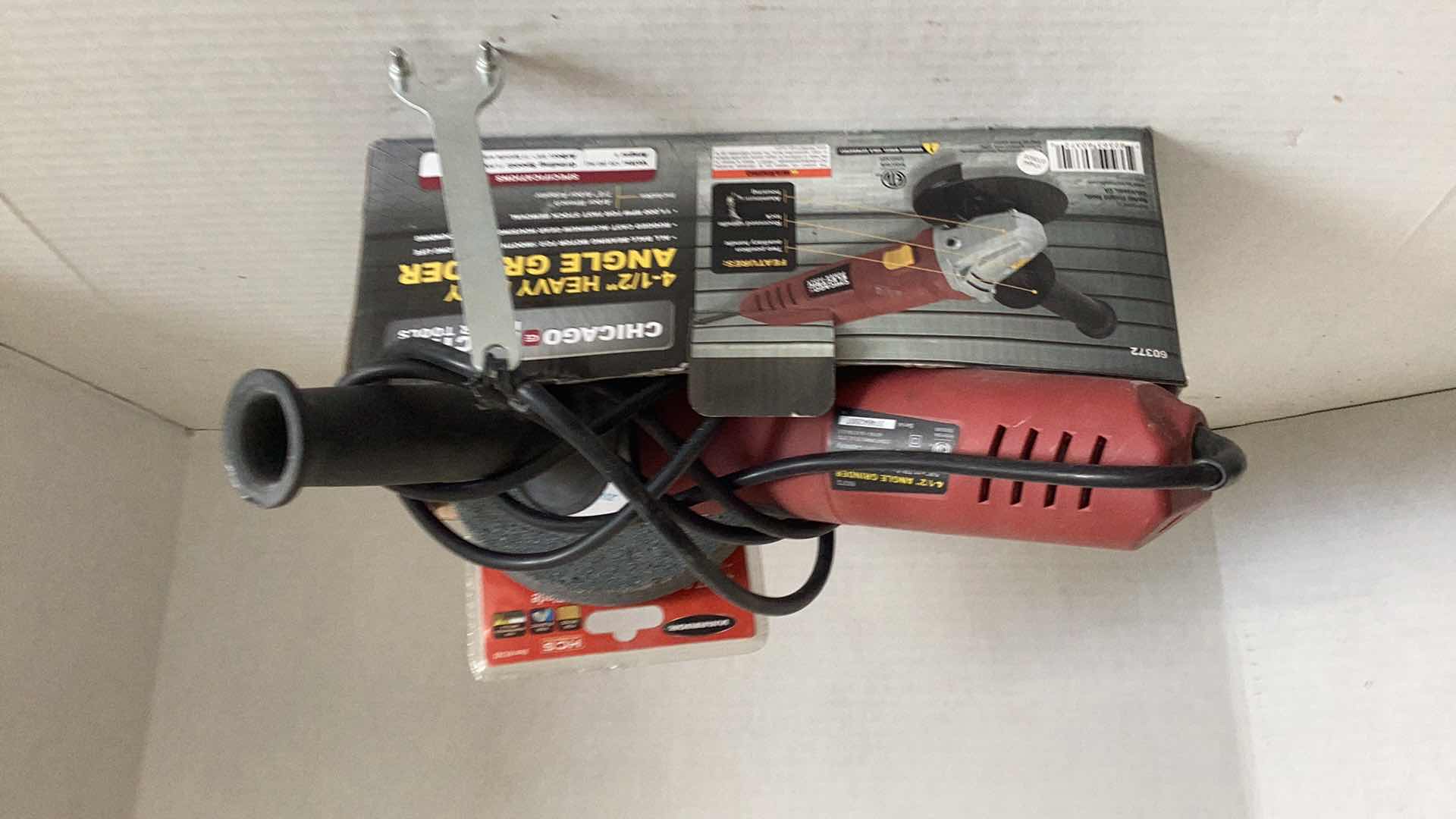 Photo 1 of CHICAGO ELECTRIC 4 1/2” ANGLE GRINDER WITH EXTRA STONES AND SAWBLADE