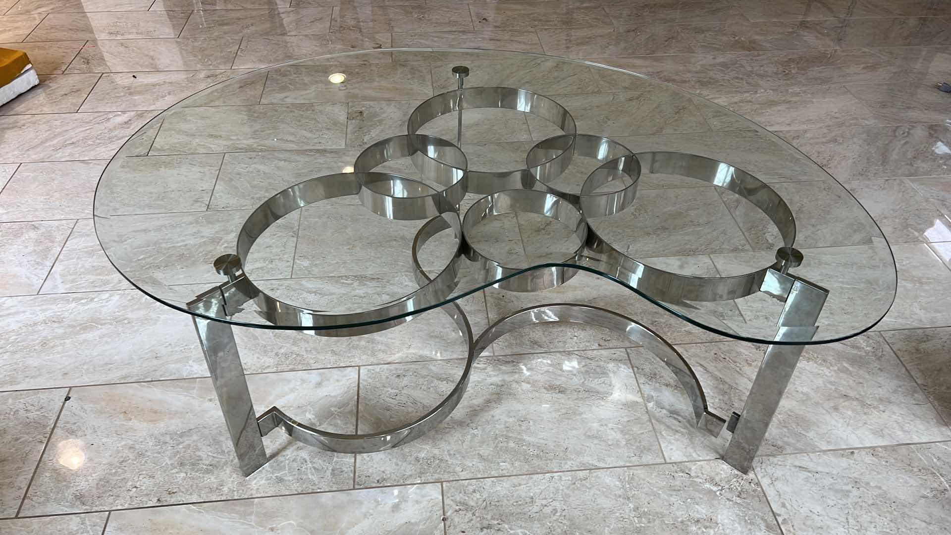 Photo 1 of MODERN SCULPTURED STEEL GLASS AND CHROME COFFEE TABLE 52” x 36” H20”