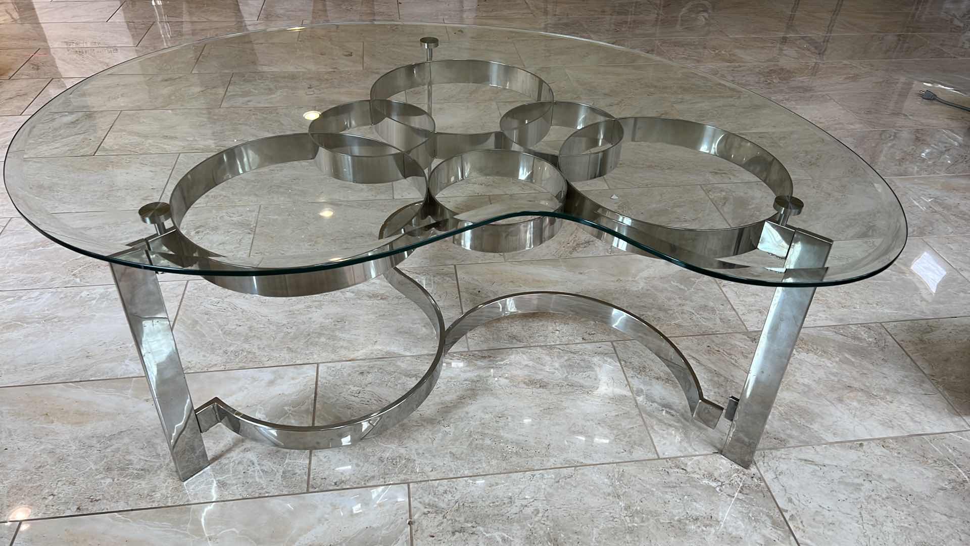 Photo 2 of MODERN SCULPTURED STEEL GLASS AND CHROME COFFEE TABLE 52” x 36” H20”