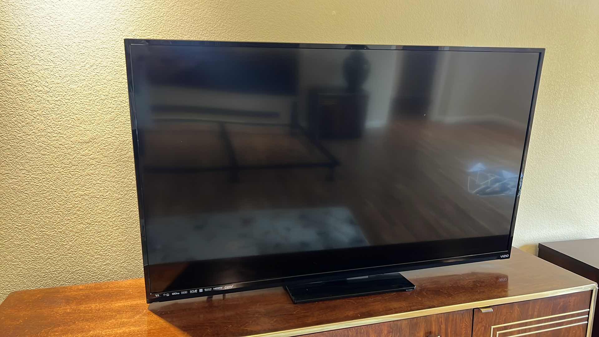 Photo 1 of 54” VIZIO TV W REMOTE ON SWIVEL STAND
