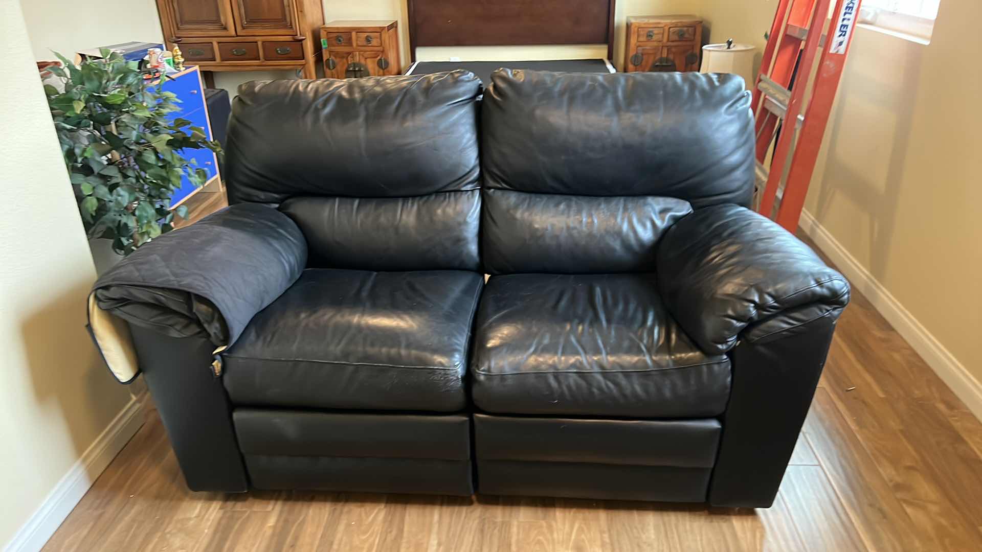 Photo 1 of BLACK LEATHER DUAL SEAT MANUAL RECLINERS