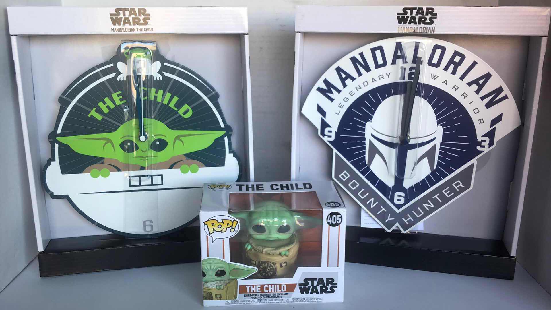 Photo 1 of MANDALORIAN GIFT SET THE CHILD AND BOUNTY HUNTER WALL CLOCKS WITH THE CHILD FUNKO POP