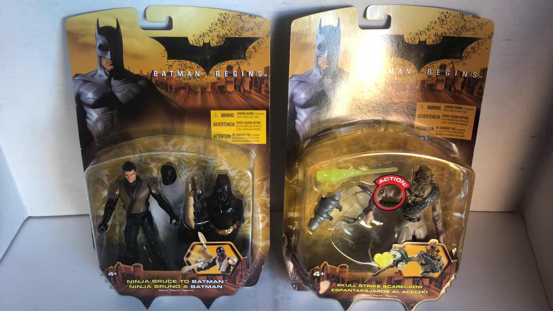 Photo 1 of NIB BATMAN BEGINS NINJA BRUCE TO BATMAN AND SKULL STRIKE SCARECROW ACTION FIGURES AND ACCESSORIES