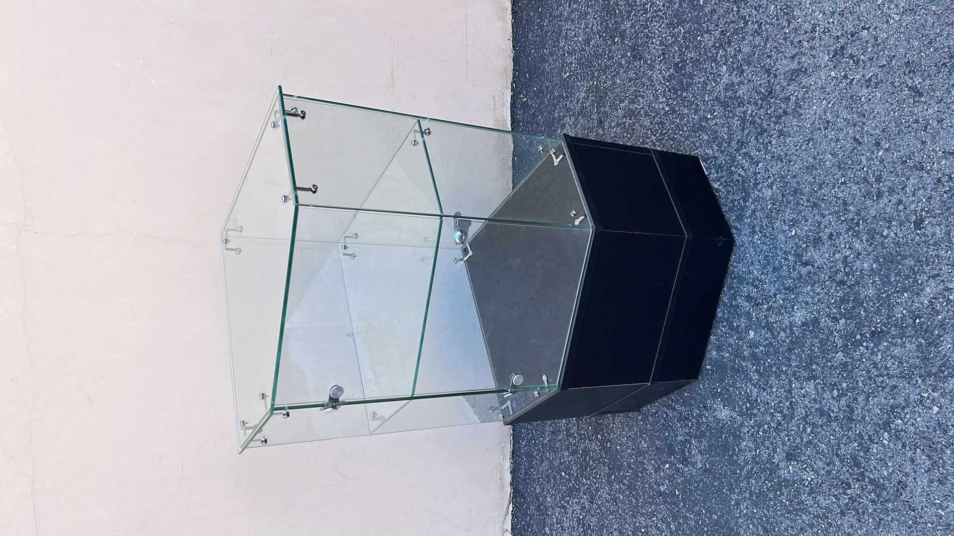 Photo 1 of CORNER GLASS DISPLAY CASE 18” X 18” H38.25” (1)