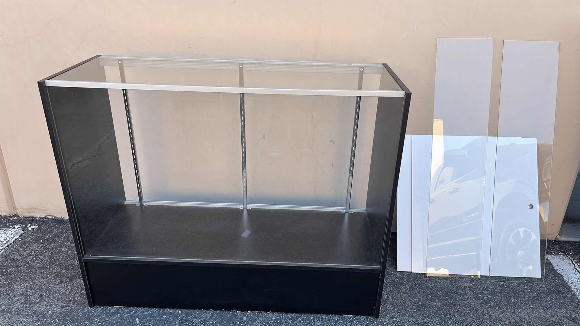 Photo 1 of GLASS MERCHANDISE DISPLAY CASE W 2 GLASS SHELF & 2 DOORS 18” X 48” H38.25”