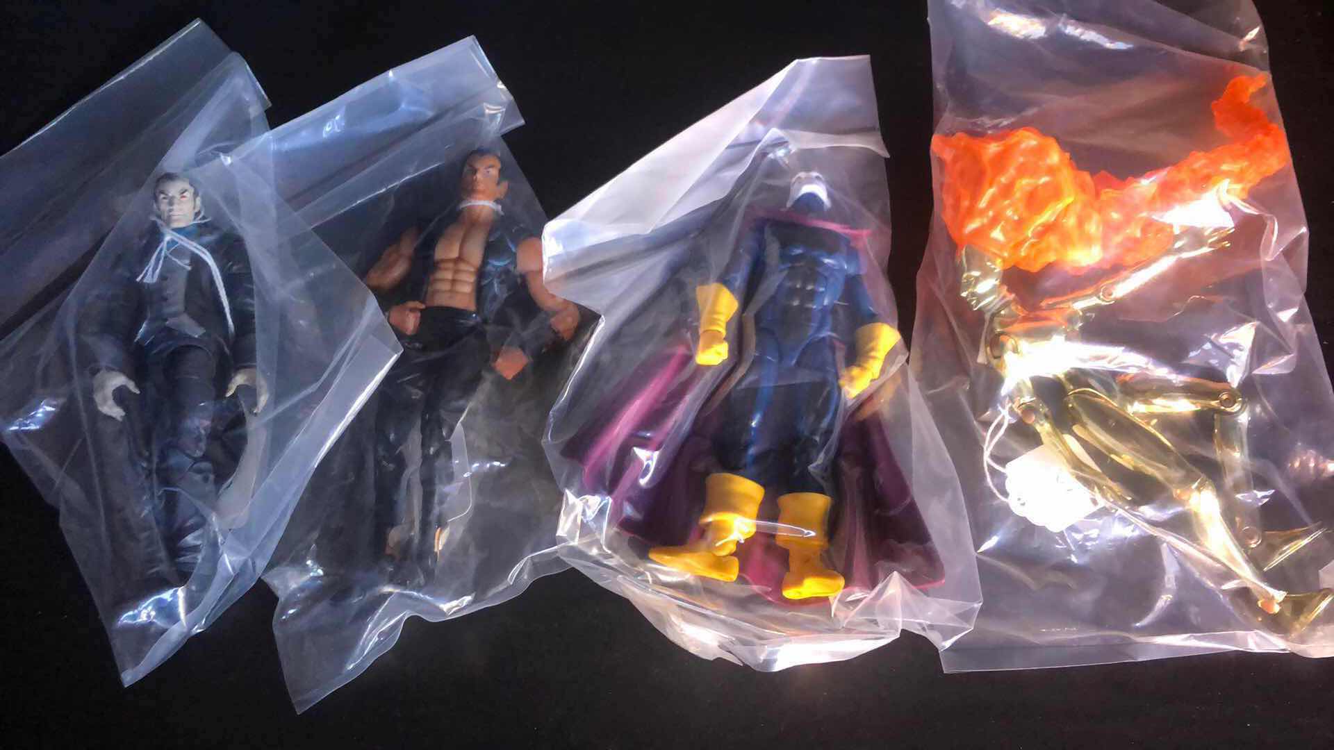 Photo 1 of ASSORTMENT OF UNBOXED ACTION FIGURES (4)