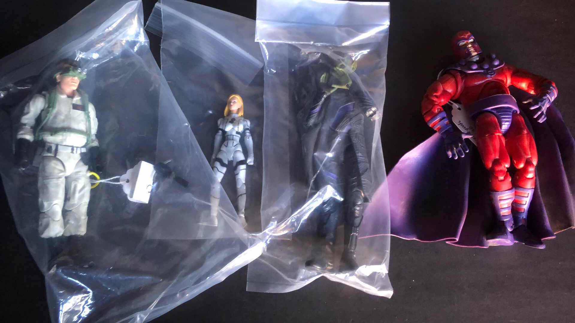 Photo 1 of ASSORTMENT OF UNBOXED ACTION FIGURES (4)