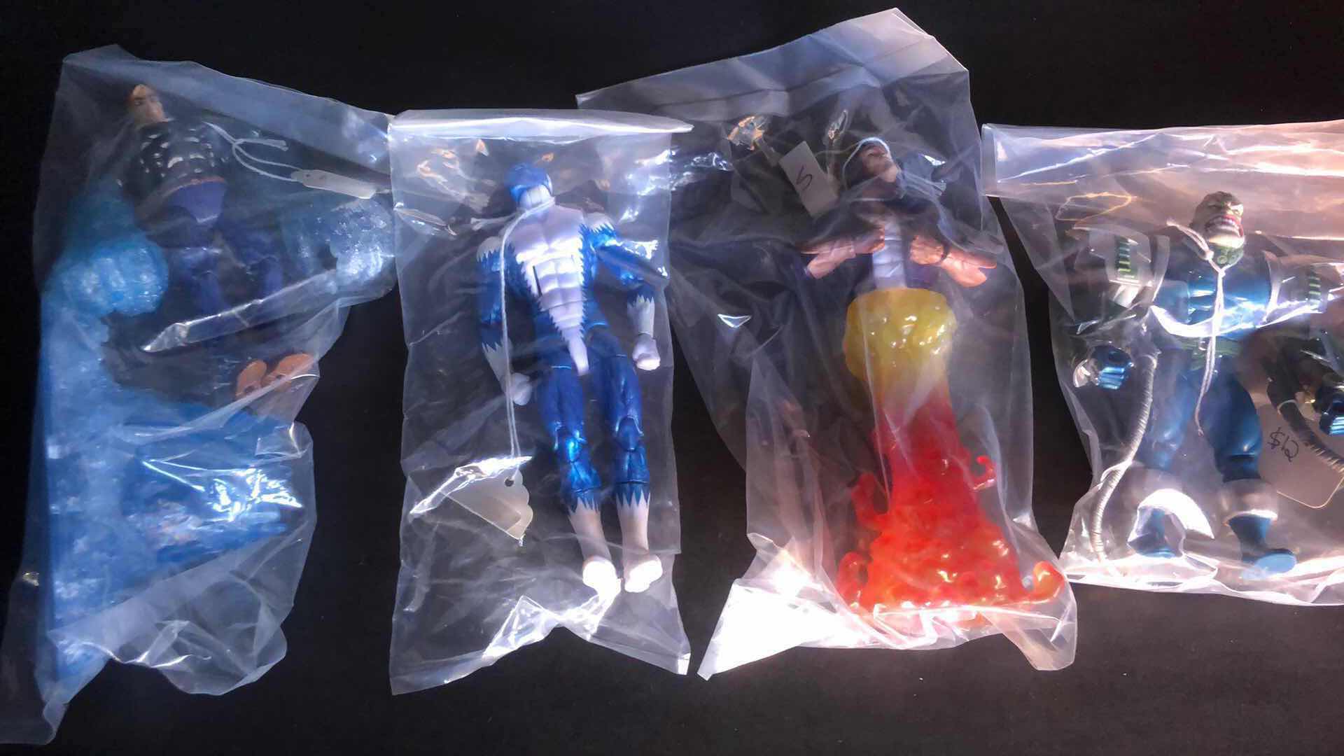 Photo 1 of ASSORTMENT OF UNBOXED ACTION FIGURES (4)