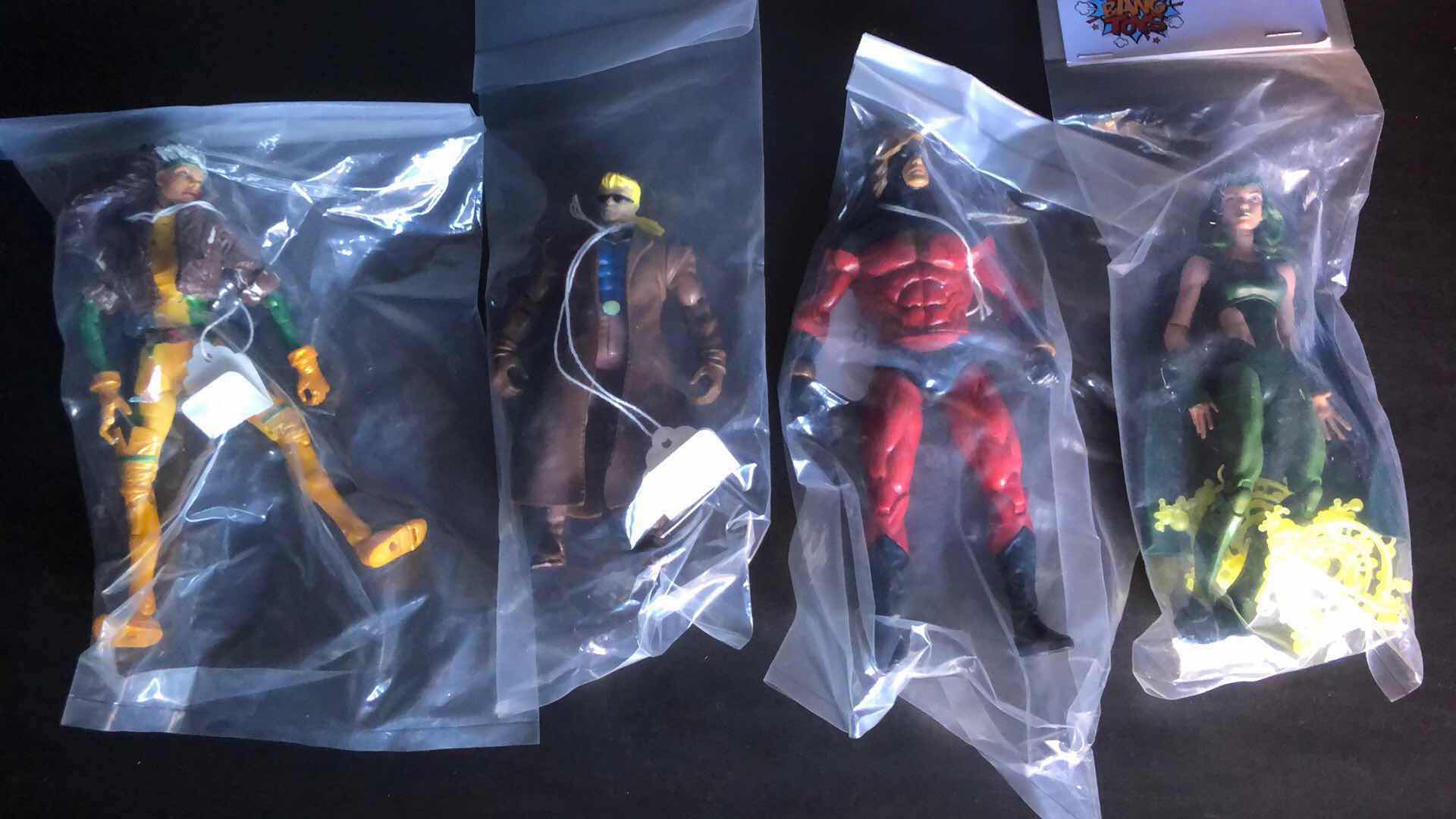 Photo 1 of ASSORTMENT OF UNBOXED ACTION FIGURES (4)