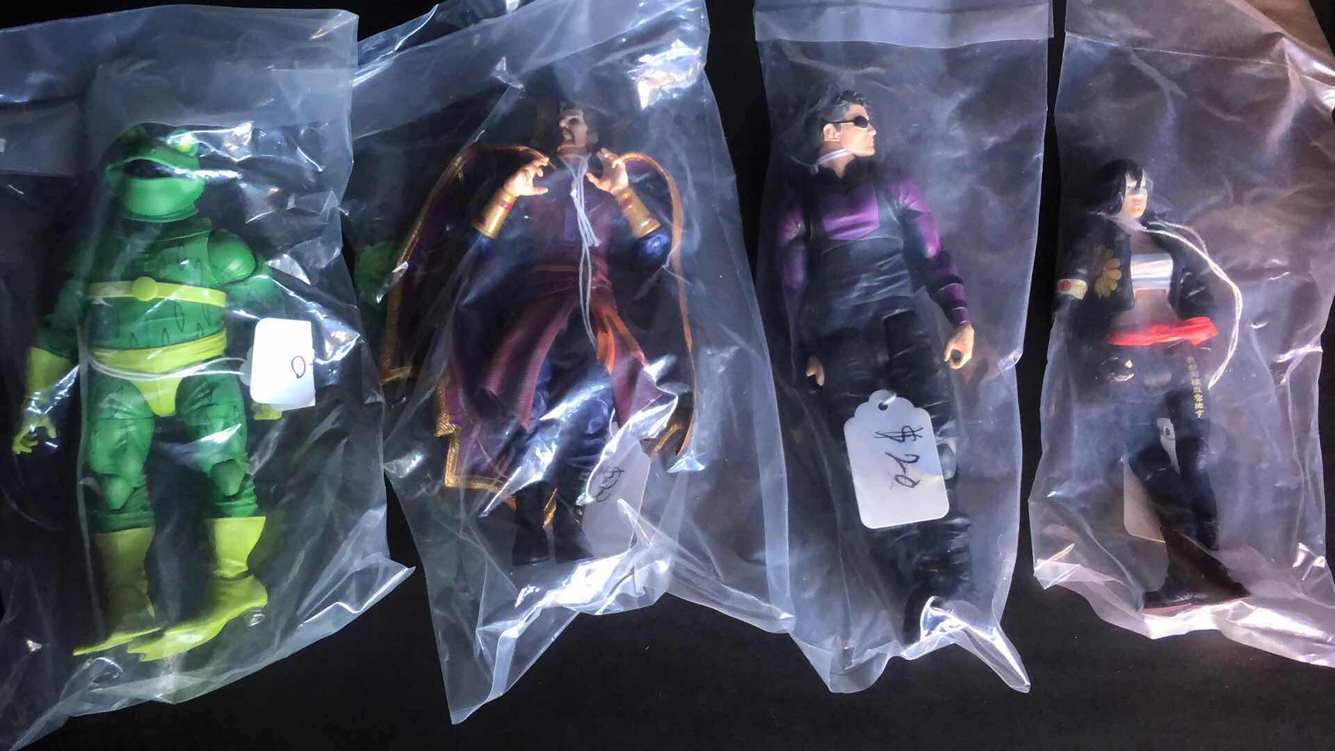 Photo 1 of ASSORTMENT OF UNBOXED ACTION FIGURES (4)