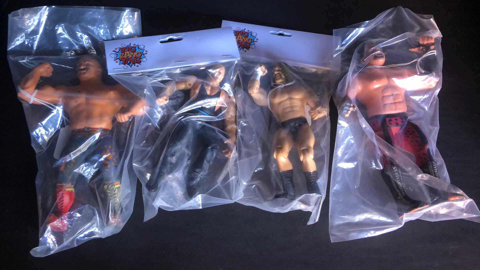 Photo 1 of ASSORTMENT OF UNBOXED WRESTLING ACTION FIGURES (4)