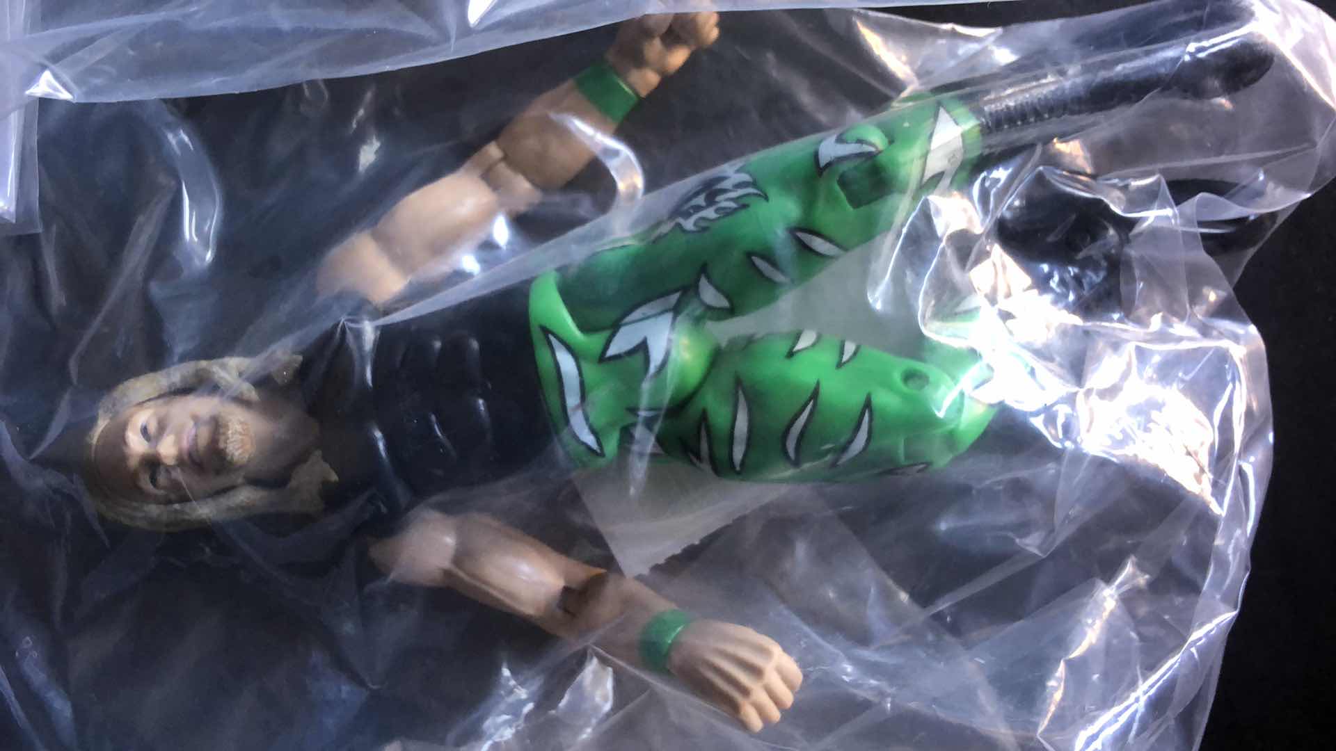 Photo 4 of ASSORTMENT OF UNBOXED WRESTLING ACTION FIGURES (4)