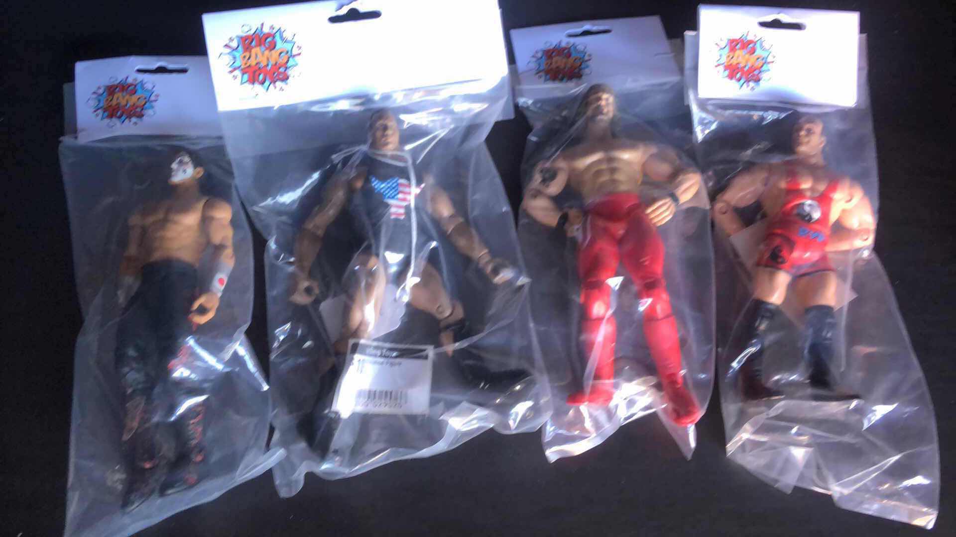 Photo 1 of ASSORTMENT OF UNBOXED WRESTLING ACTION FIGURES (4)