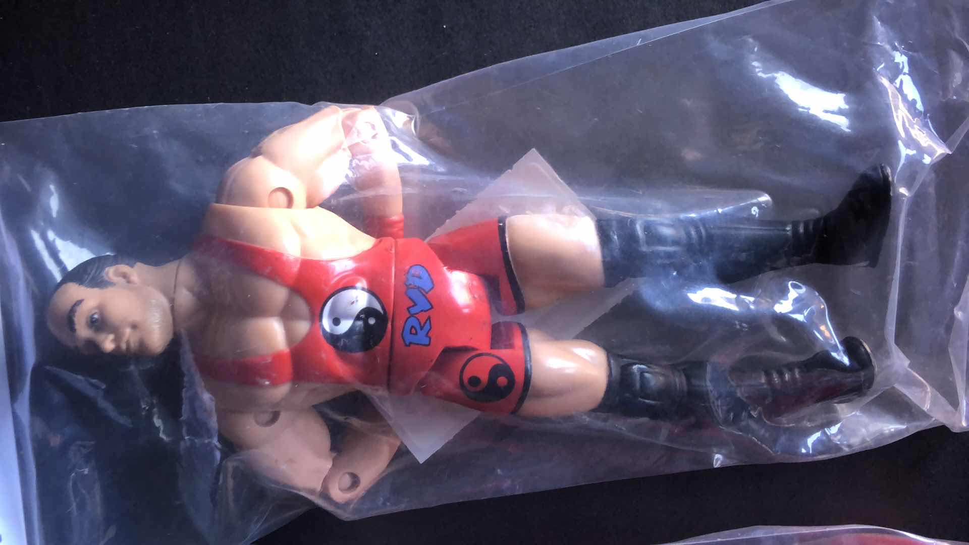 Photo 5 of ASSORTMENT OF UNBOXED WRESTLING ACTION FIGURES (4)