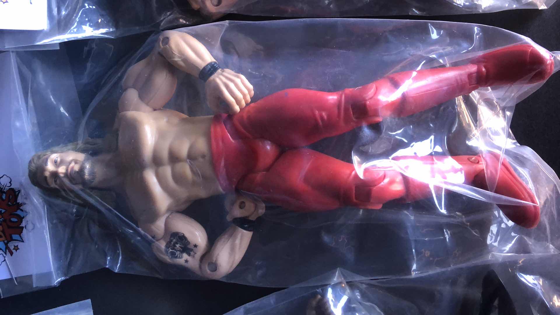 Photo 4 of ASSORTMENT OF UNBOXED WRESTLING ACTION FIGURES (4)