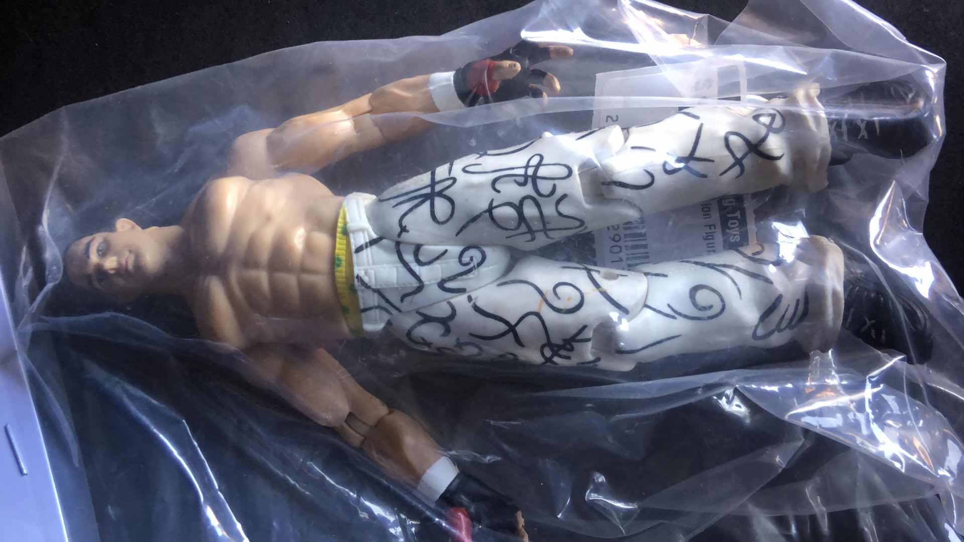 Photo 5 of ASSORTMENT OF UNBOXED WRESTLING ACTION FIGURES (4)