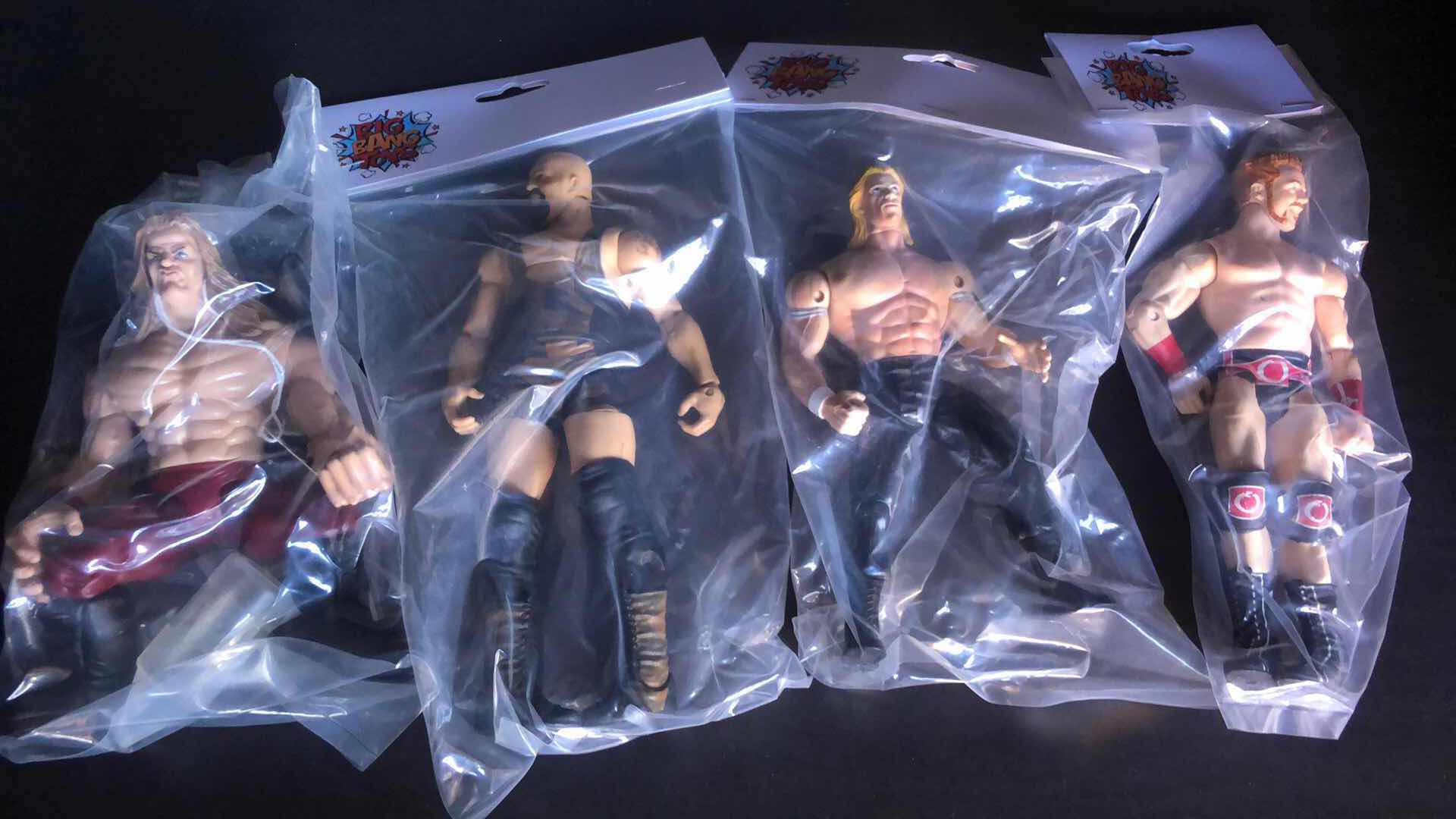 Photo 1 of ASSORTMENT OF UNBOXED WRESTLING ACTION FIGURES (4)