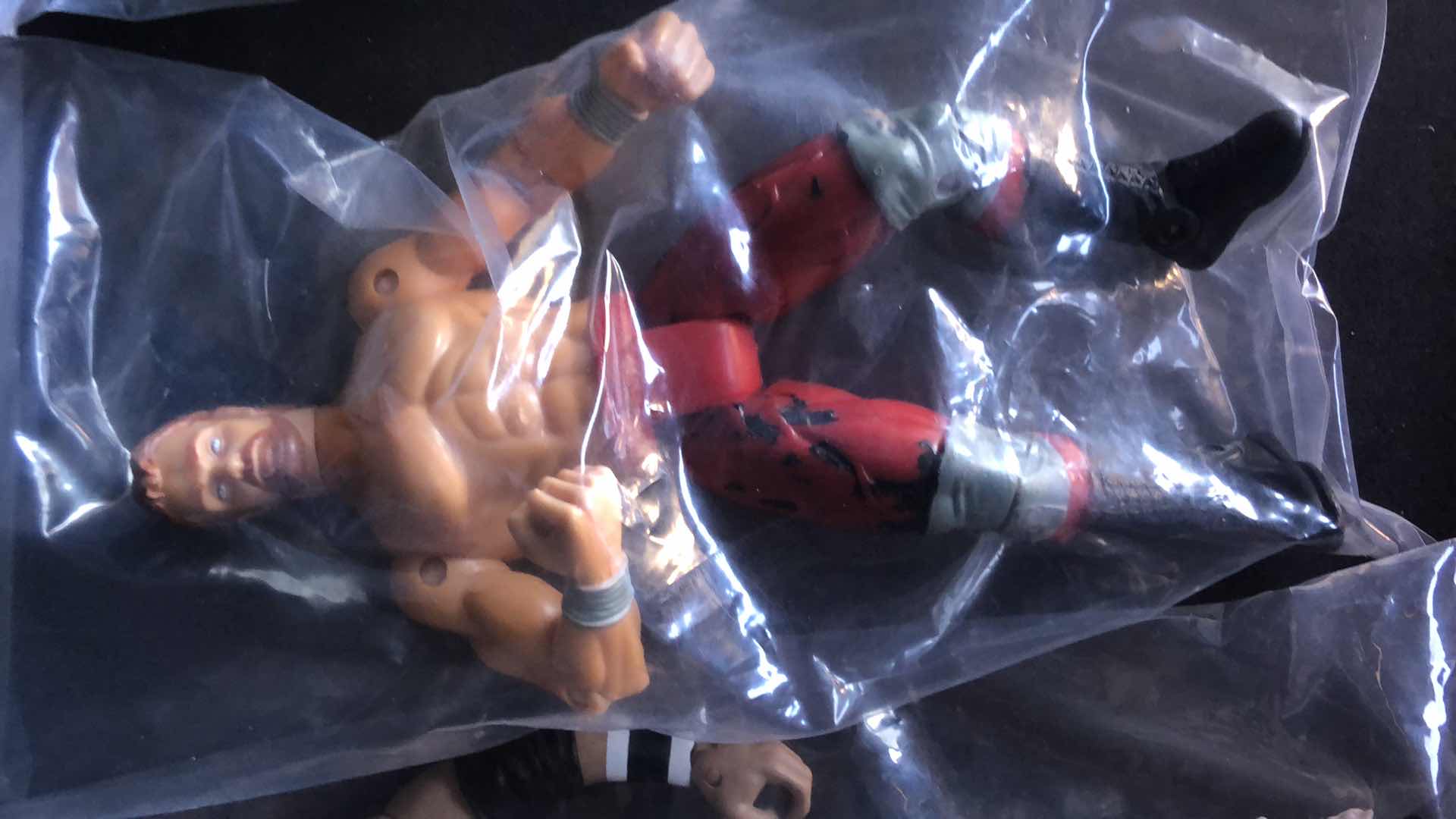 Photo 4 of ASSORTMENT OF UNBOXED WRESTLING ACTION FIGURES (4)