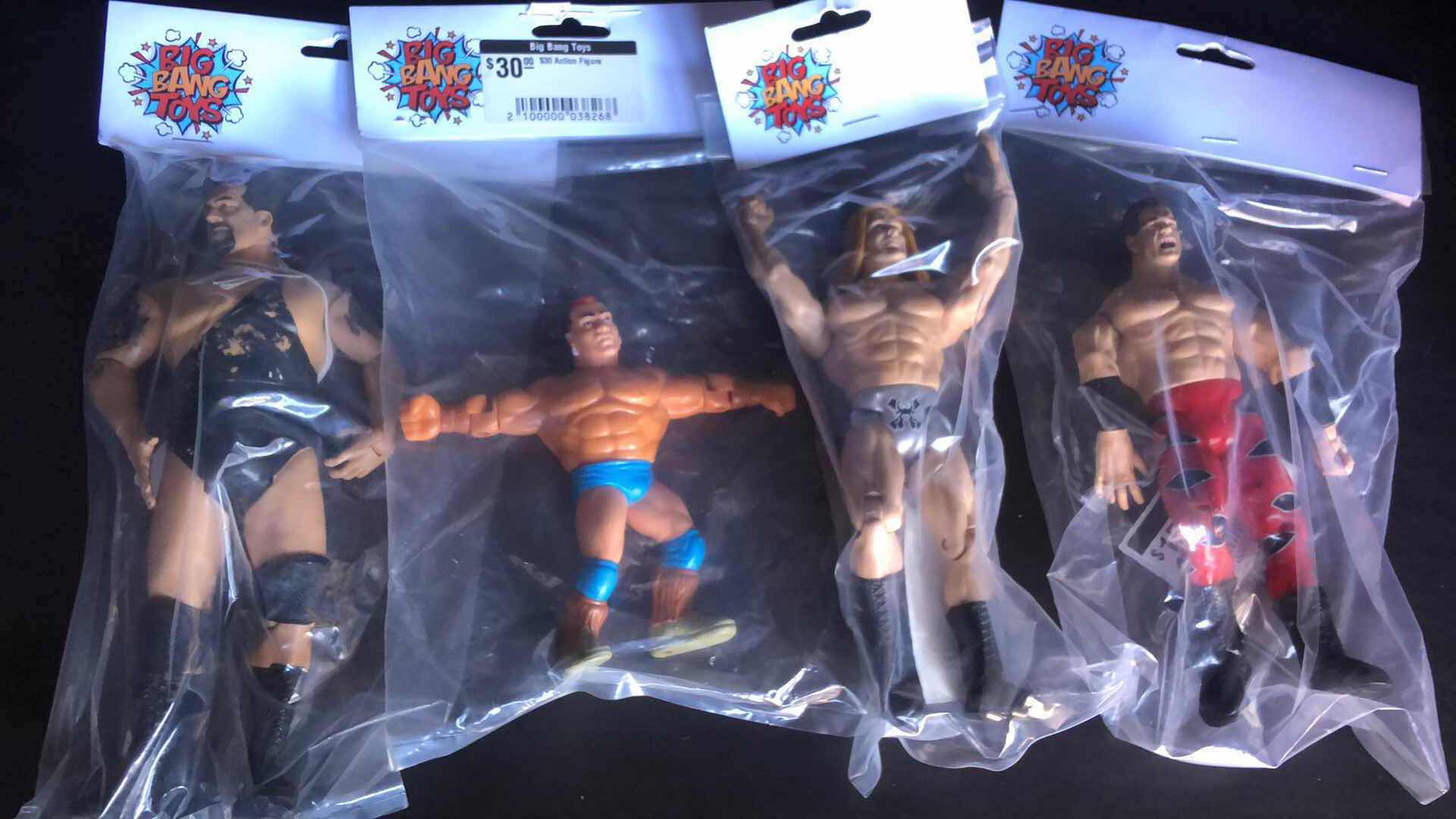 Photo 1 of ASSORTMENT OF UNBOXED WRESTLING ACTION FIGURES (4)
