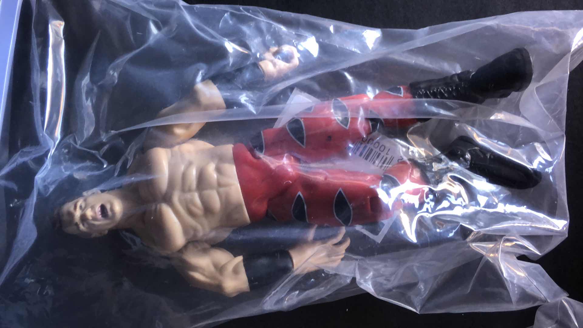 Photo 5 of ASSORTMENT OF UNBOXED WRESTLING ACTION FIGURES (4)