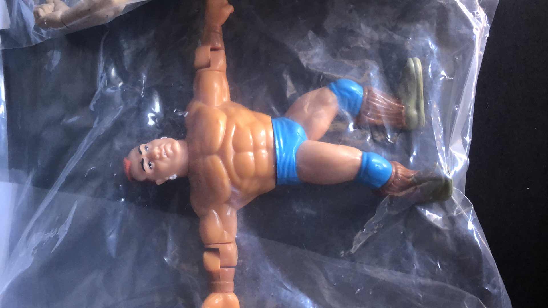 Photo 3 of ASSORTMENT OF UNBOXED WRESTLING ACTION FIGURES (4)