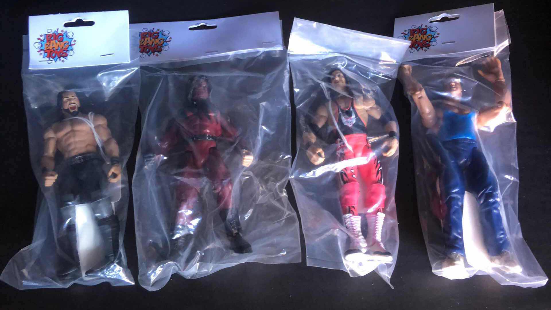 Photo 1 of ASSORTMENT OF UNBOXED WRESTLING ACTION FIGURES (4)