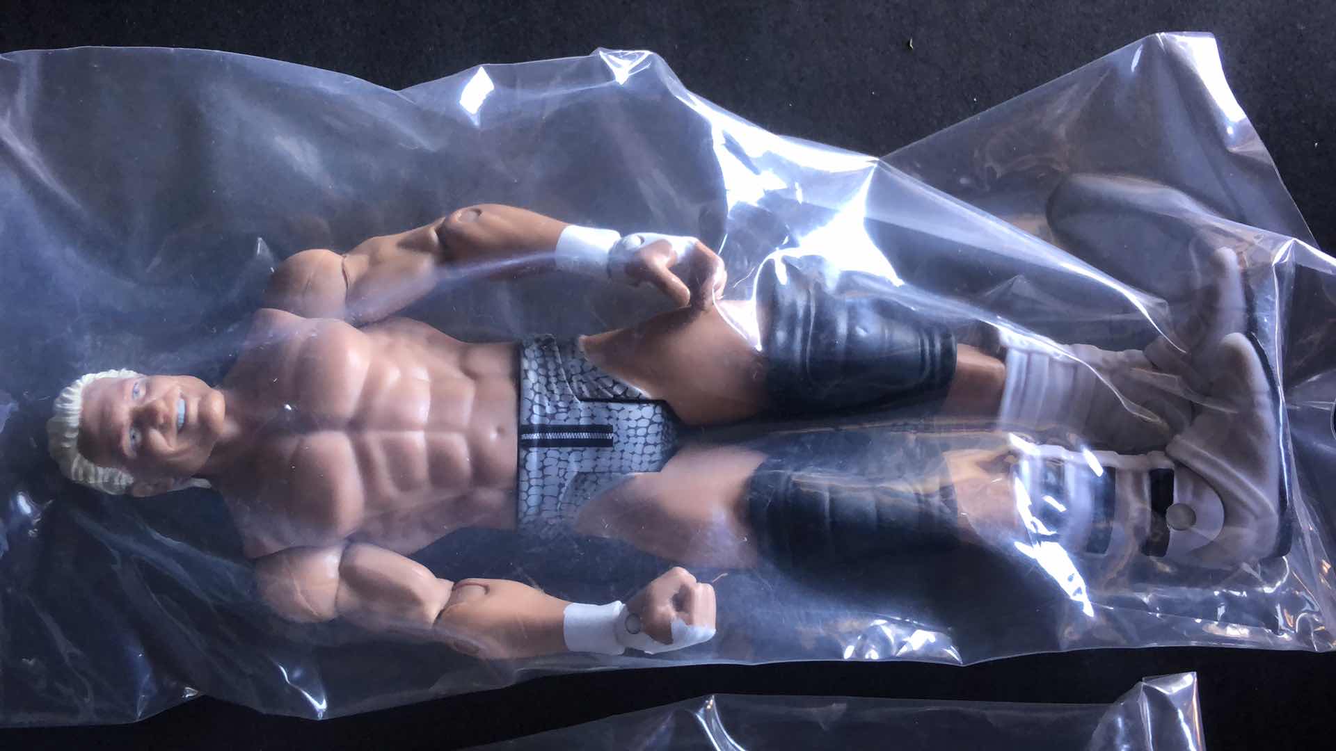 Photo 5 of ASSORTMENT OF UNBOXED WRESTLING ACTION FIGURES (4)