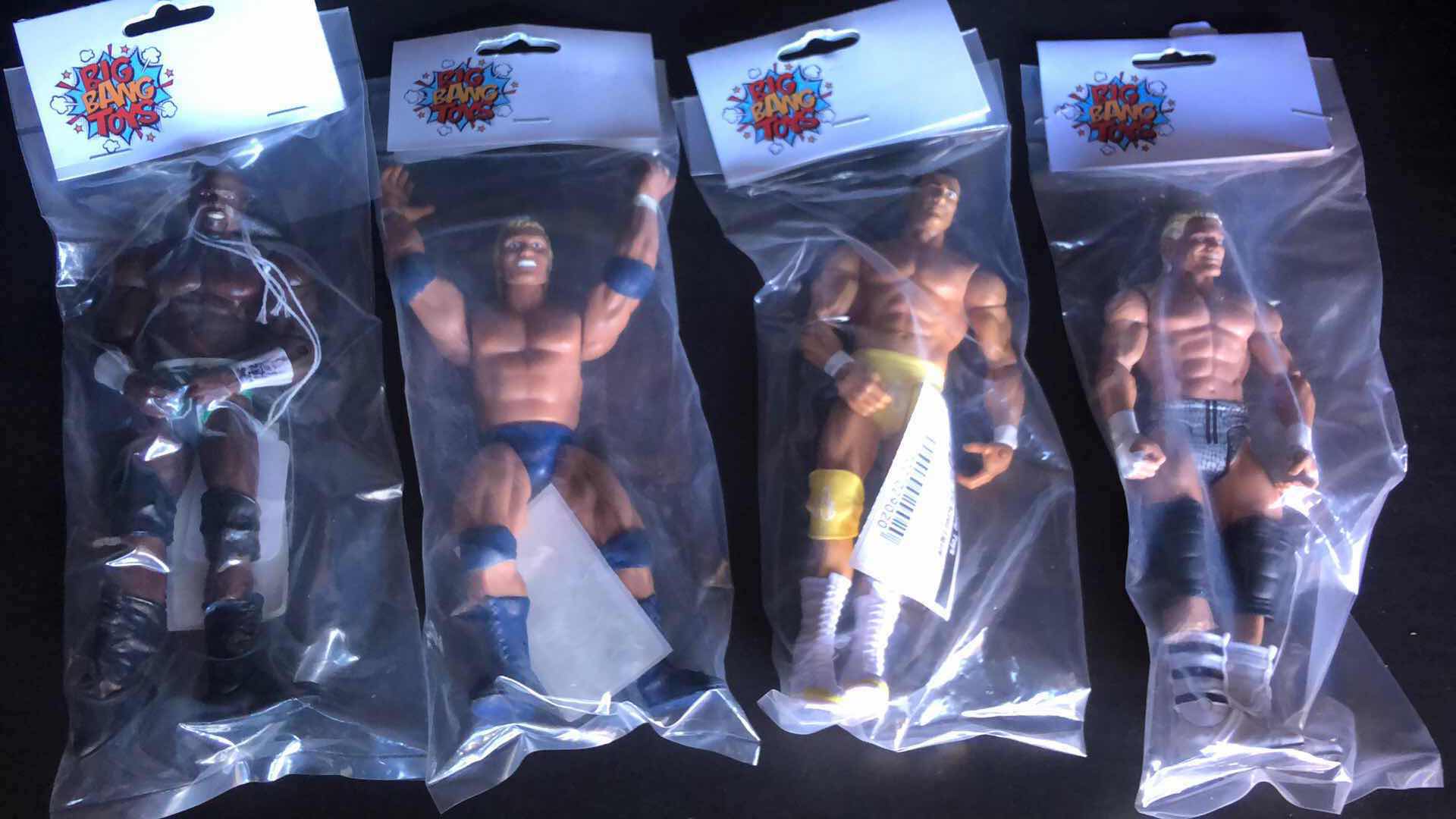 Photo 1 of ASSORTMENT OF UNBOXED WRESTLING ACTION FIGURES (4)