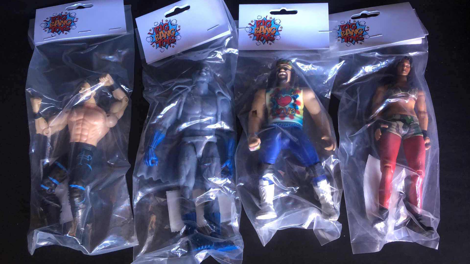 Photo 1 of ASSORTMENT OF UNBOXED WRESTLING ACTION FIGURES (4)