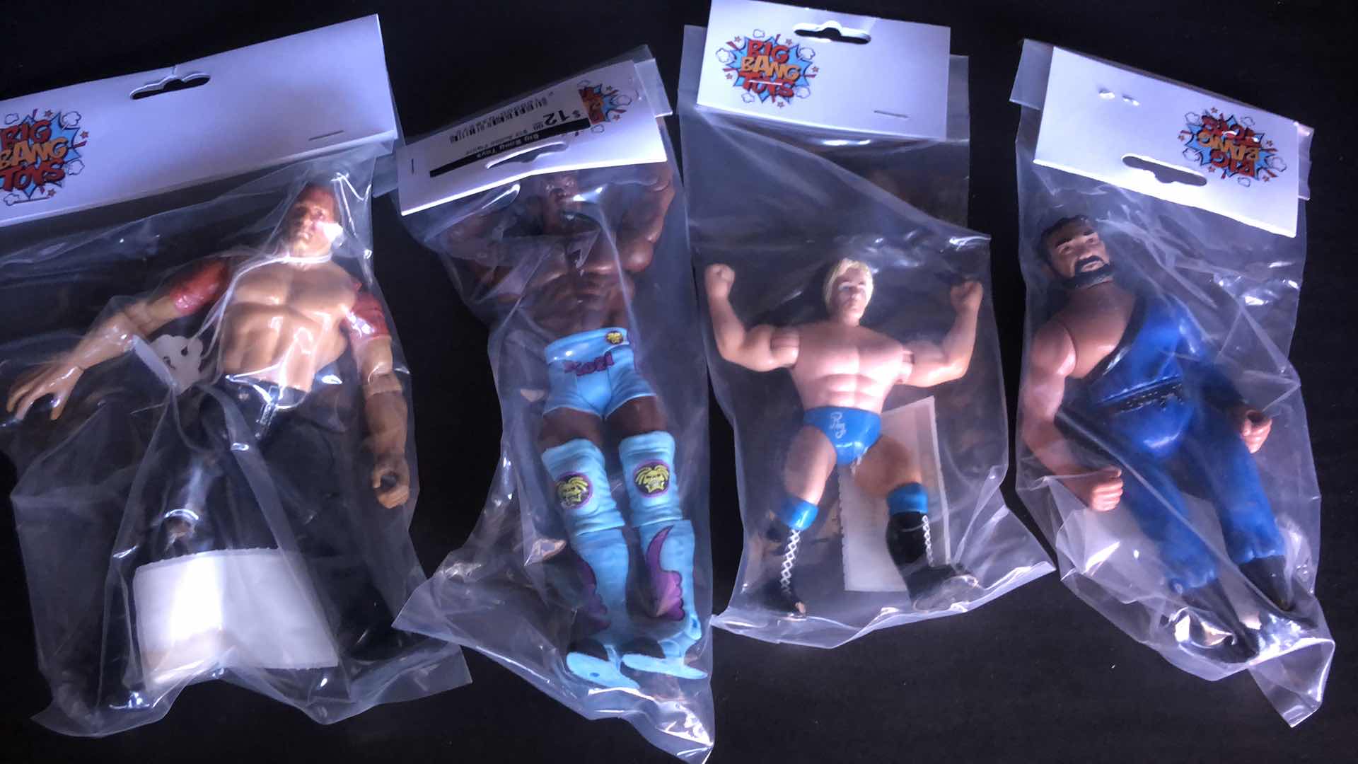 Photo 1 of ASSORTMENT OF UNBOXED WRESTLING ACTION FIGURES (4)